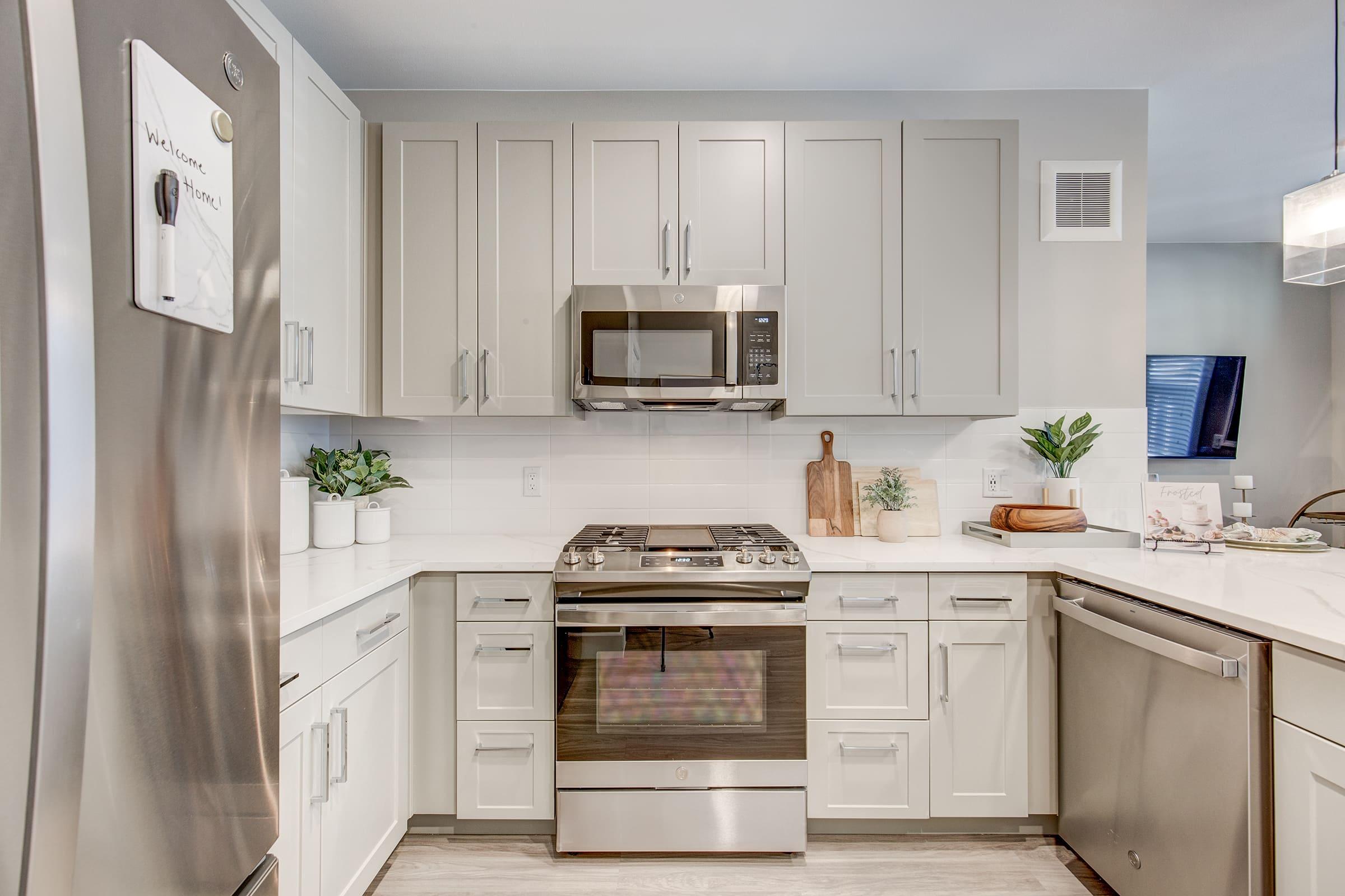 a kitchen with a stove top oven sitting inside of a refrigerator