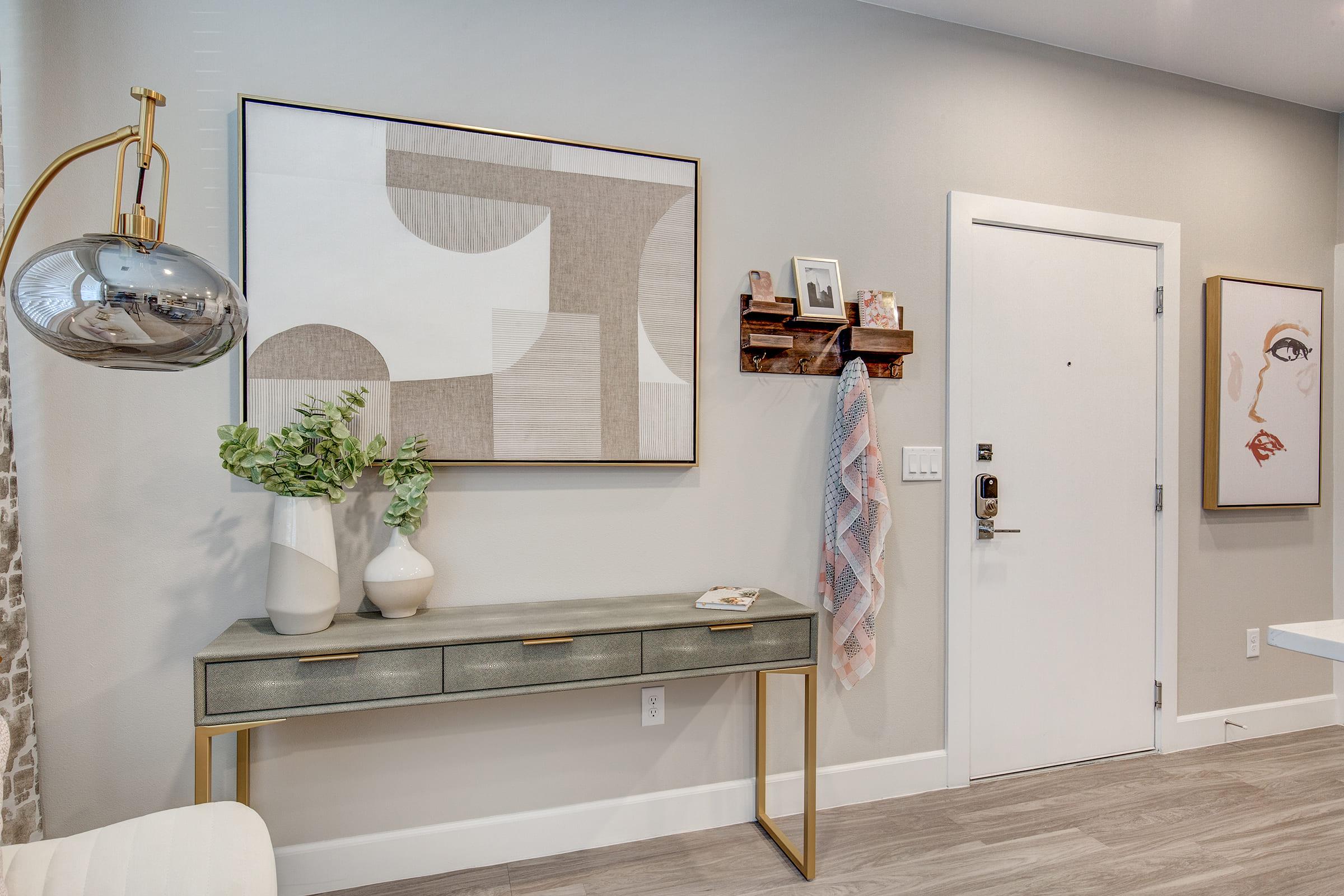 a room with a sink and a mirror