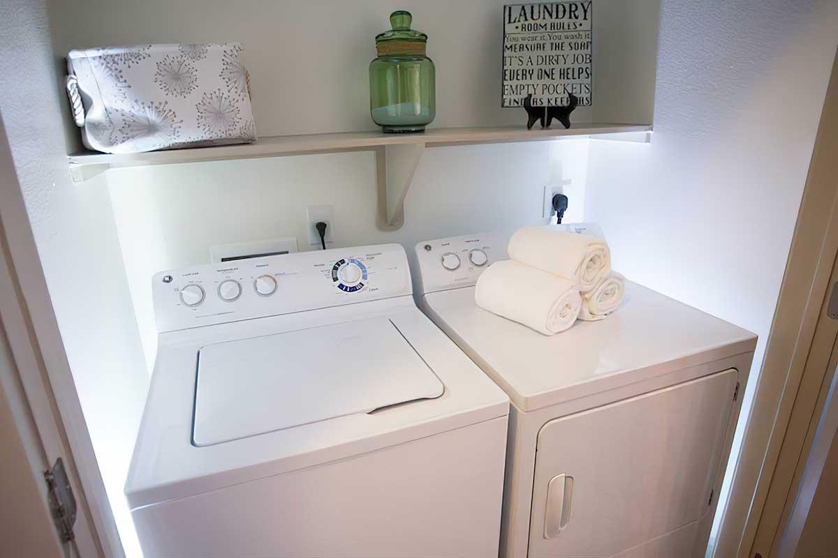 a kitchen with a sink and a microwave