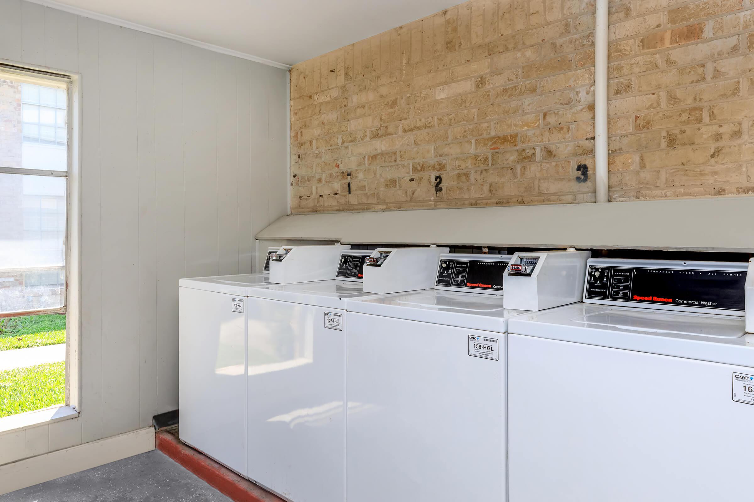 a kitchen with a stove and a refrigerator