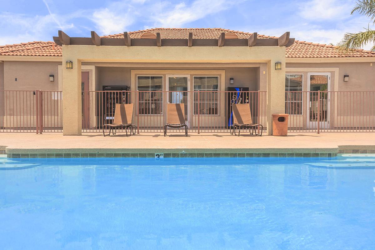 a large pool of water in front of a building