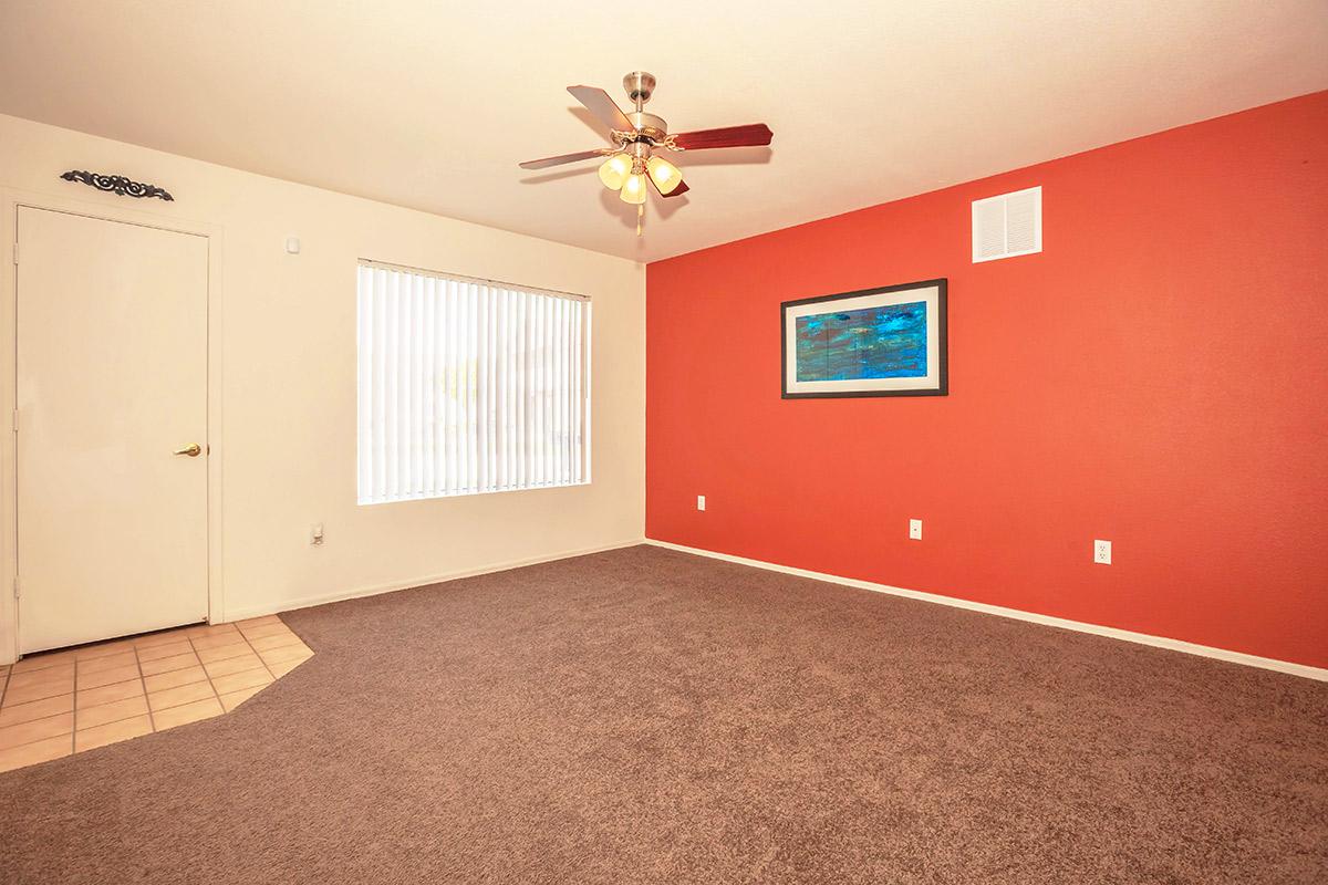 a room with red floor