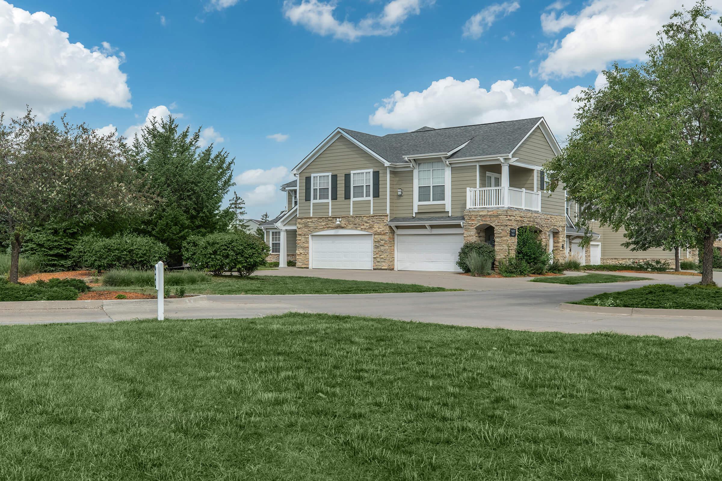 a large lawn in front of a house