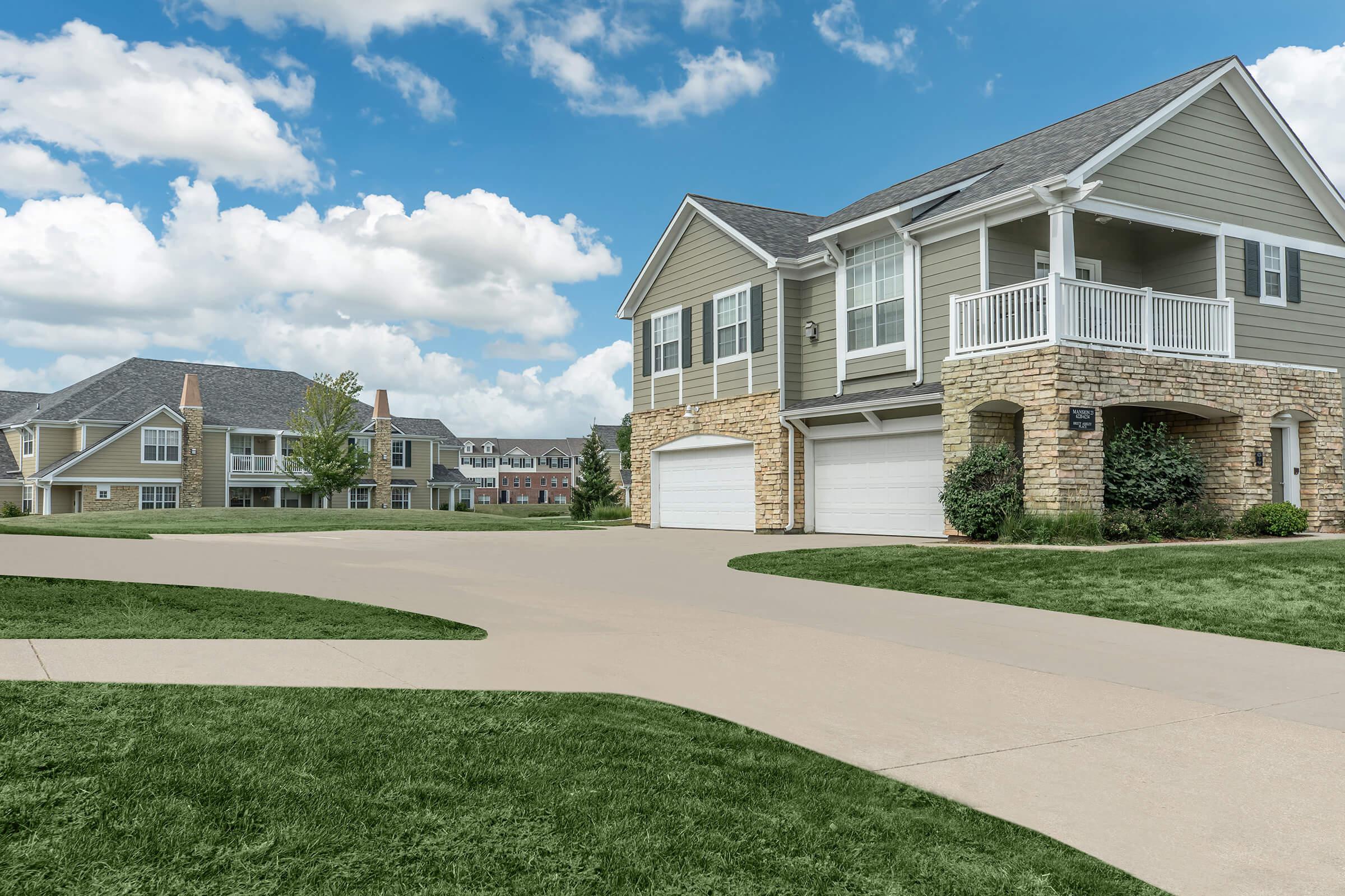 a large lawn in front of a house