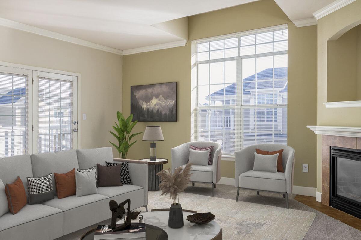 a living room filled with furniture and a large window