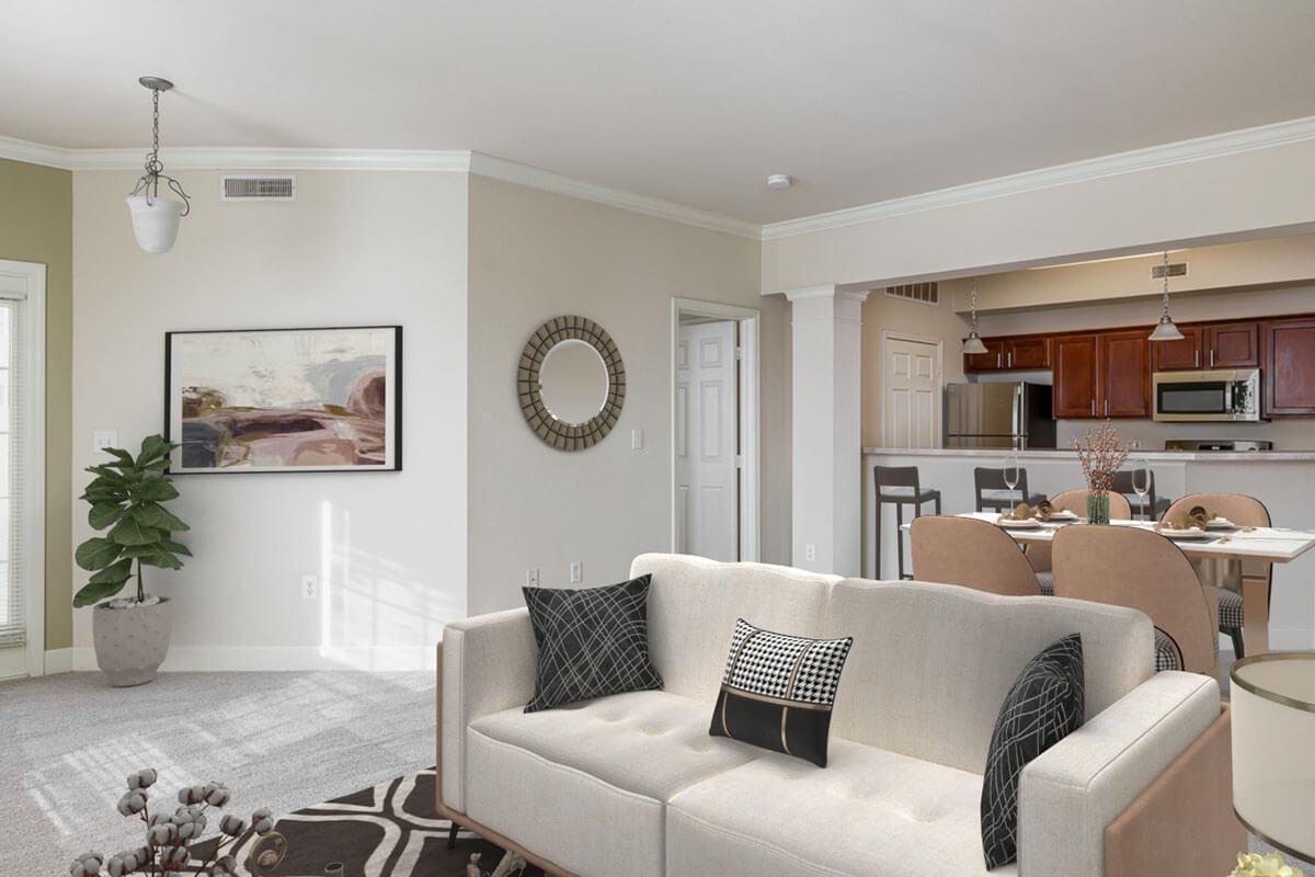 a living room filled with furniture and a flat screen tv