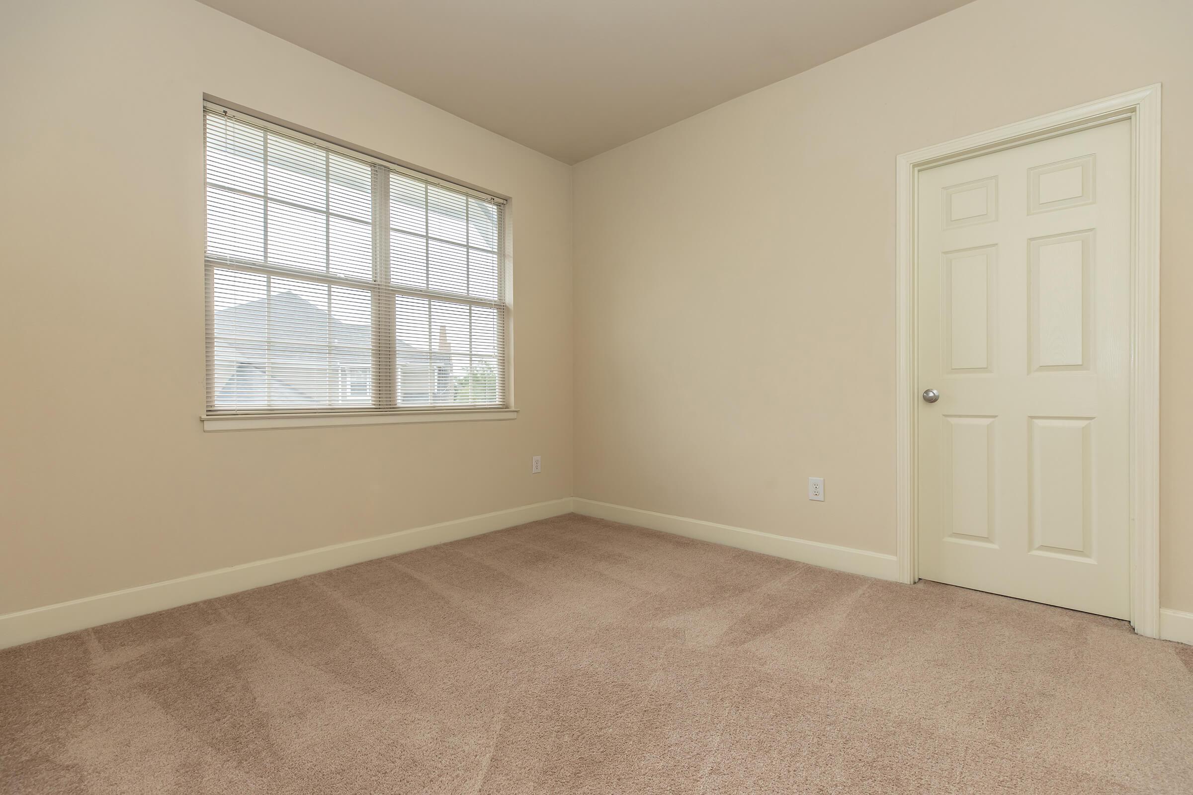 a room with a sink and a window