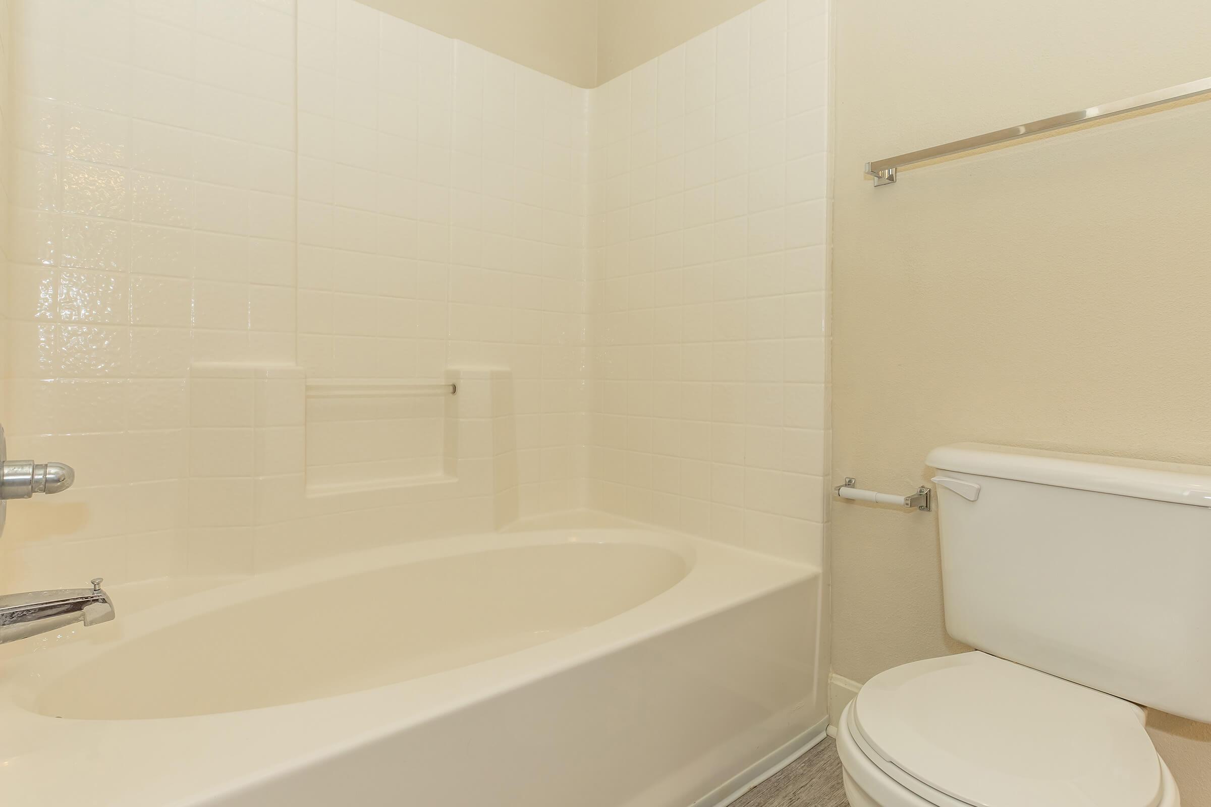 a close up of a sink and a bath tub