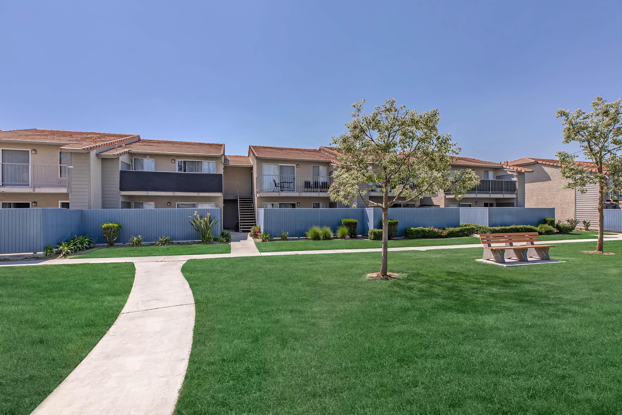 a large lawn in front of a building