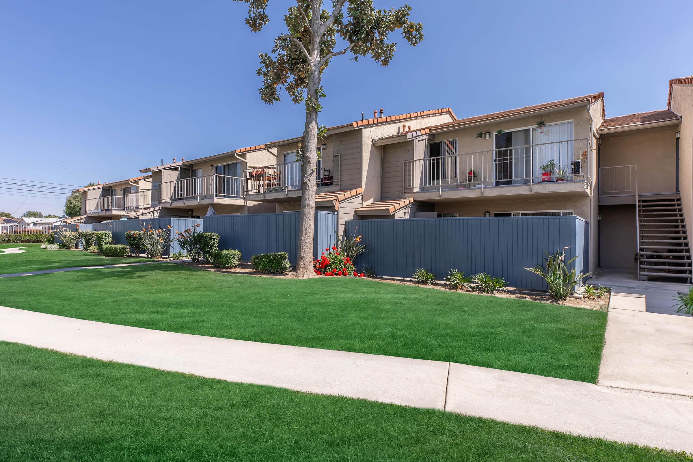 a large lawn in front of a house