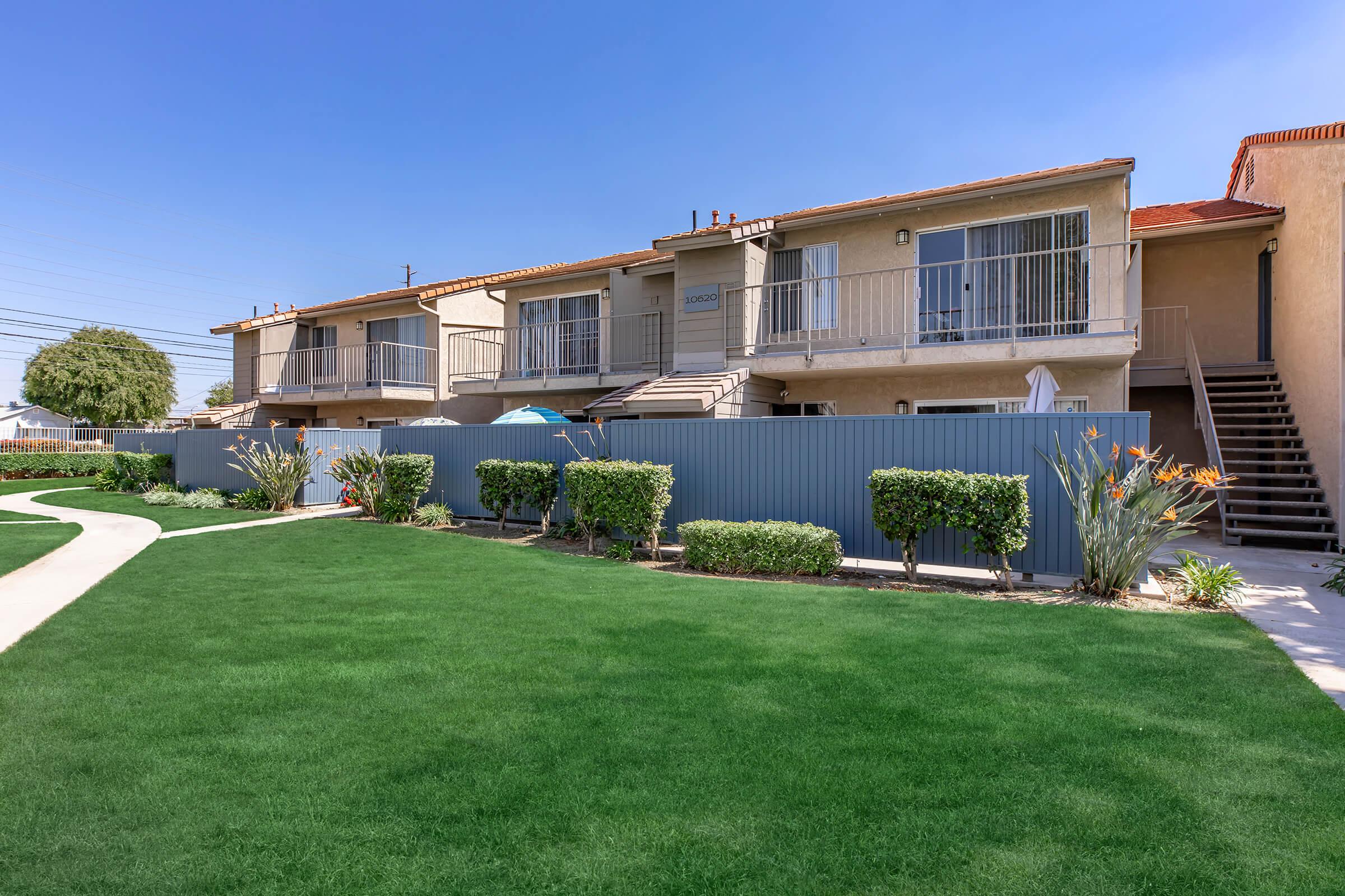 a large lawn in front of a house