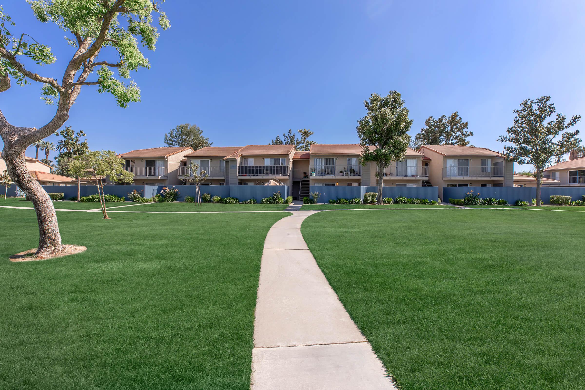 a large lawn in front of a building