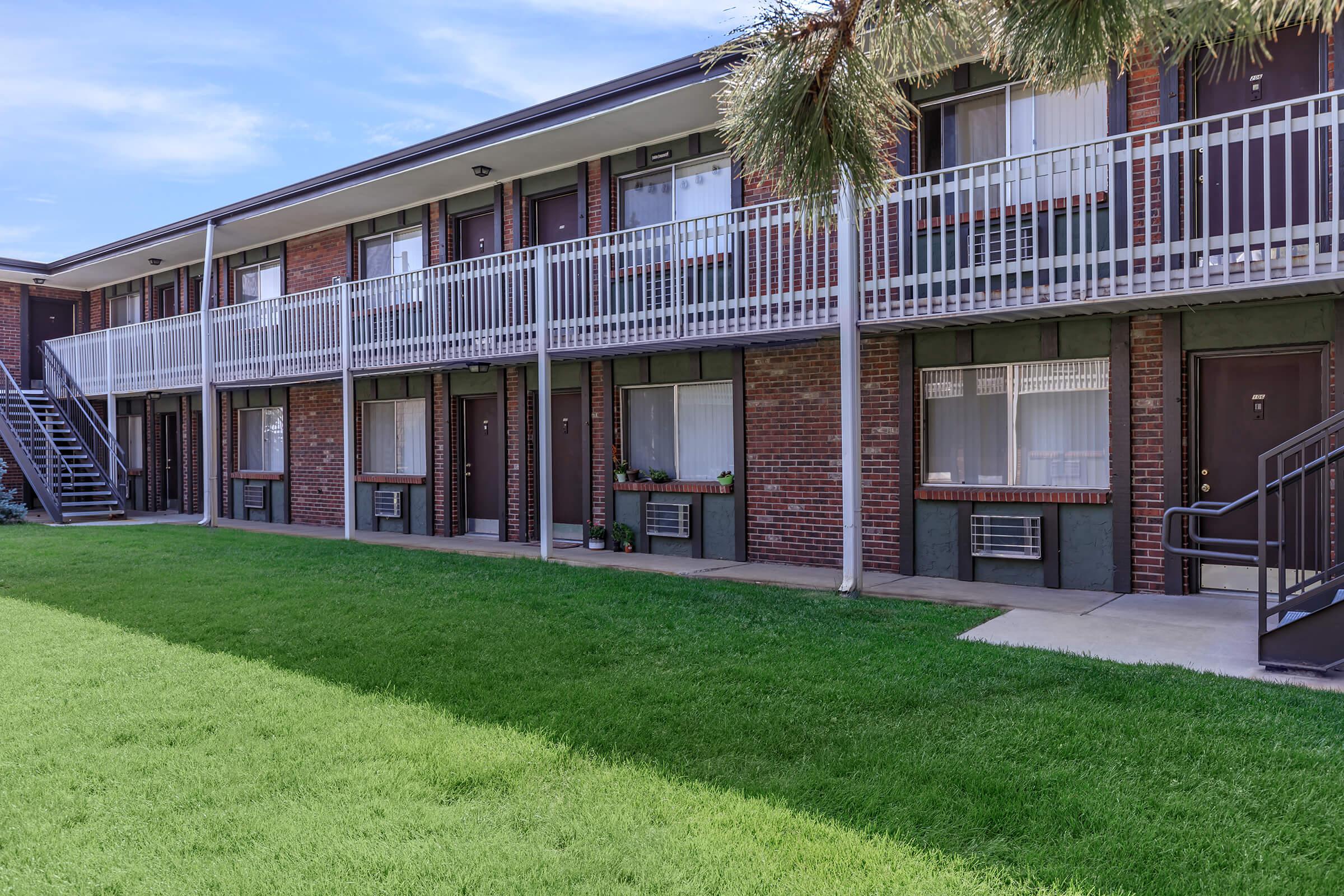 a large lawn in front of a building