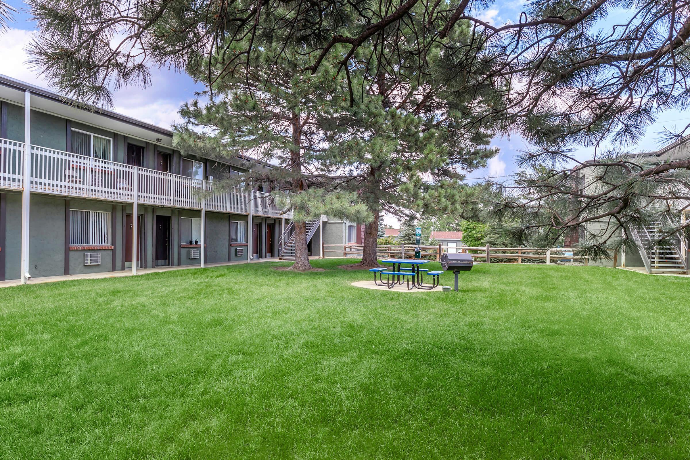 a large lawn in front of a house