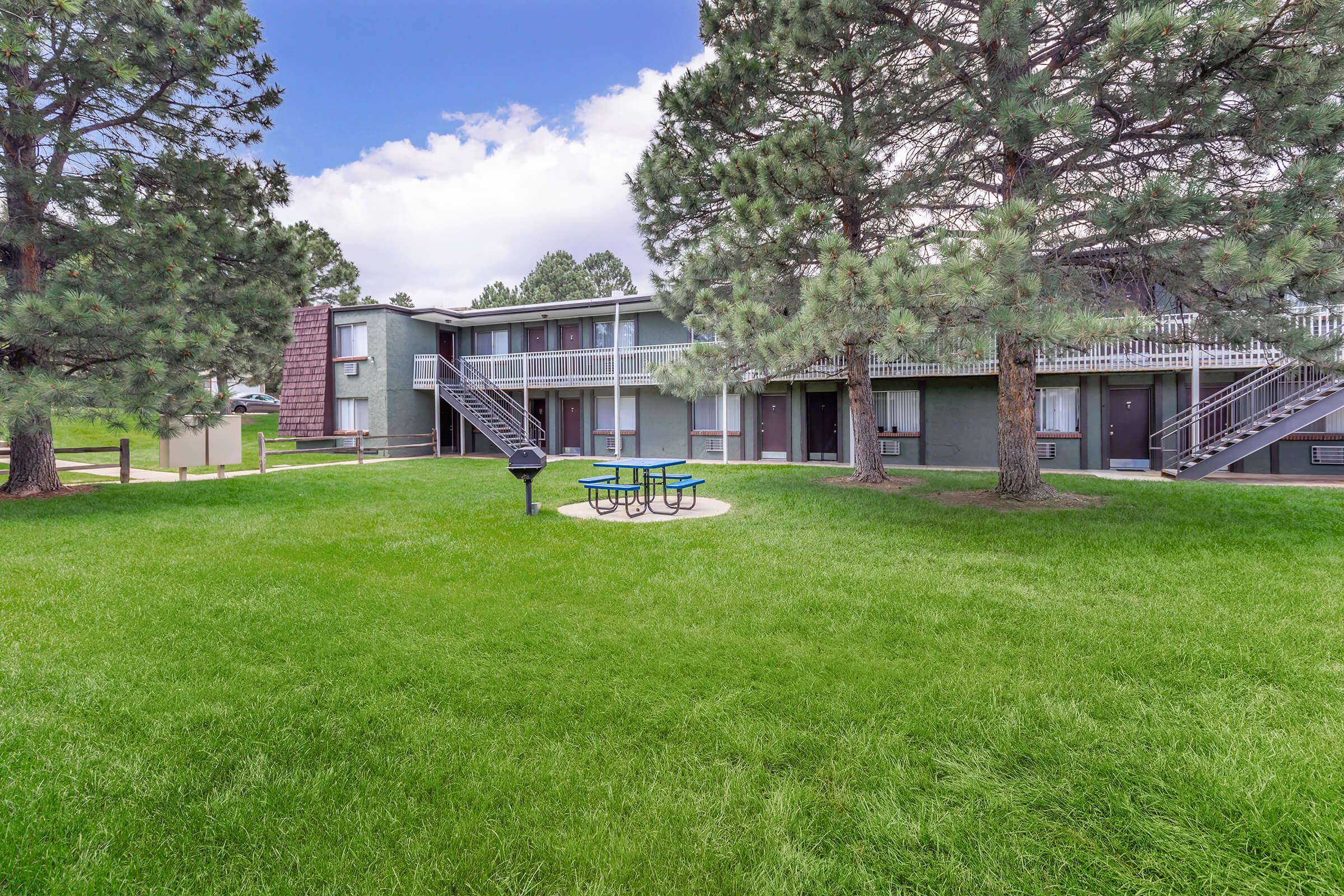 a large lawn in front of a house