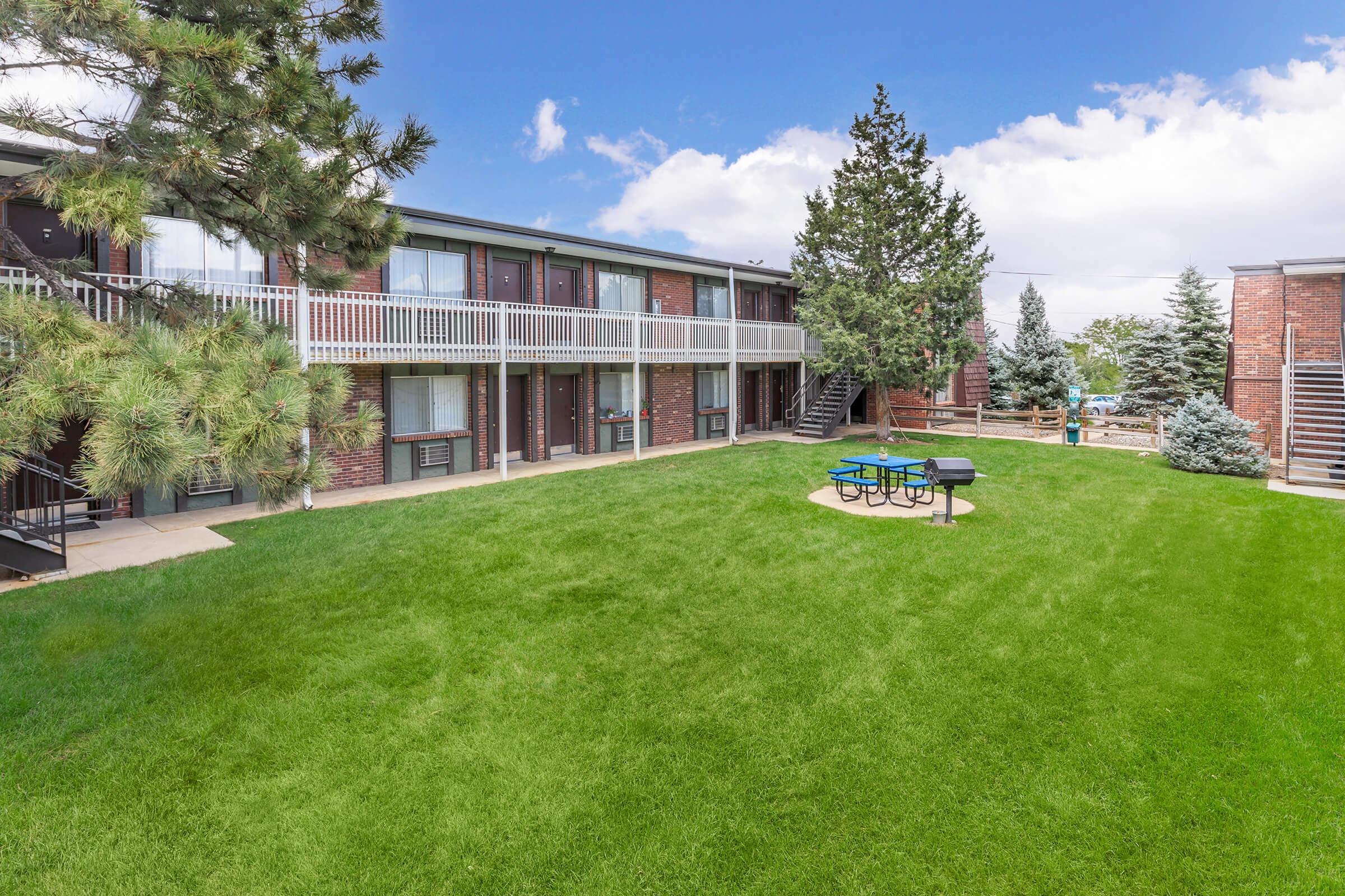 a large lawn in front of a house