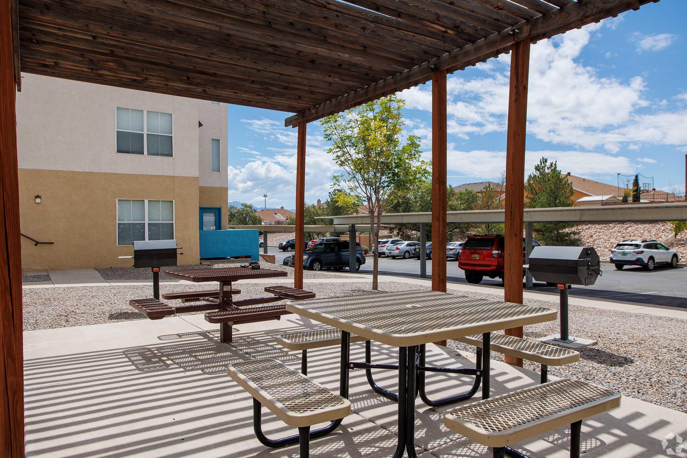 an empty chair in front of a building