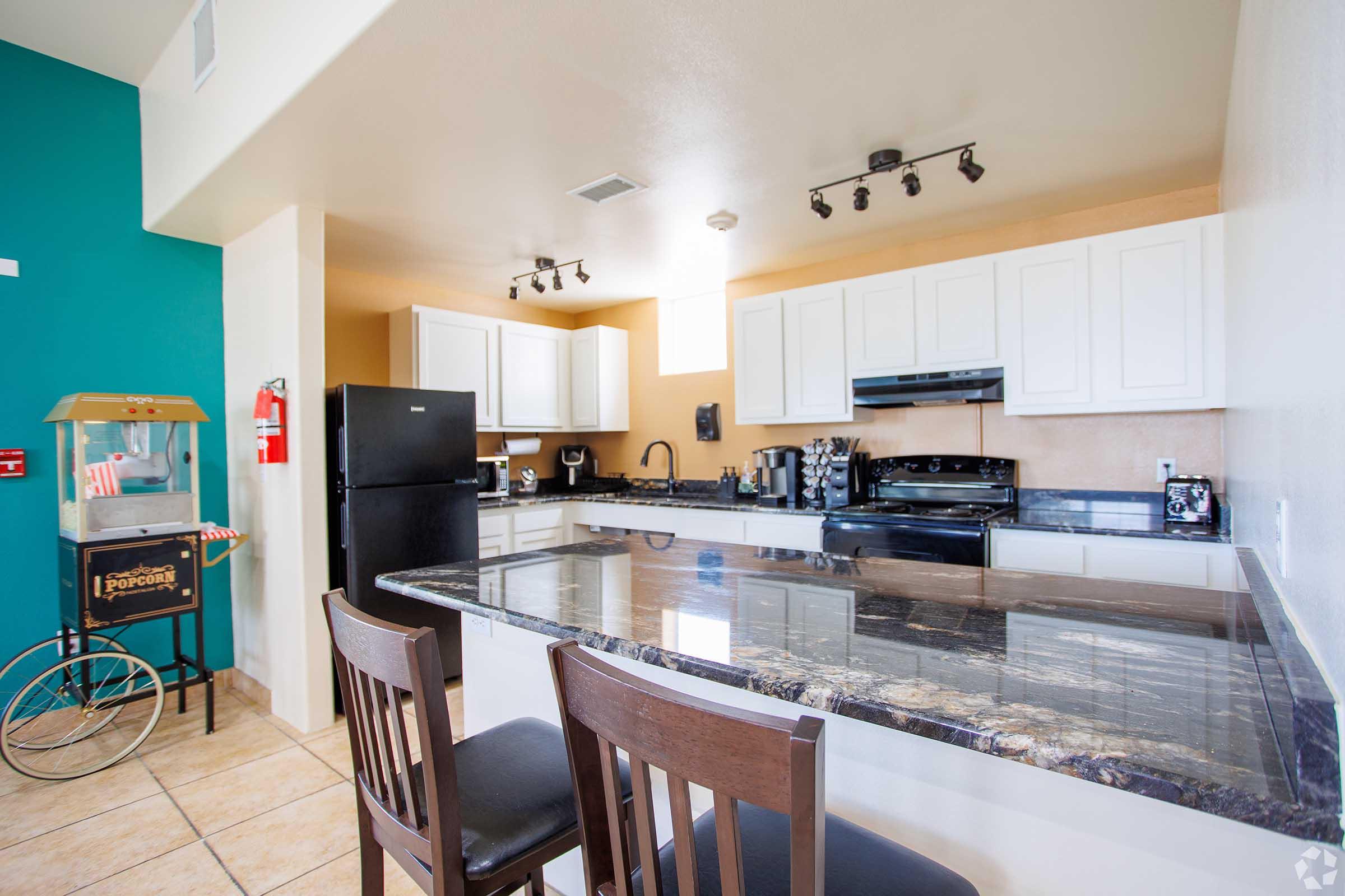 a kitchen with a dining room table