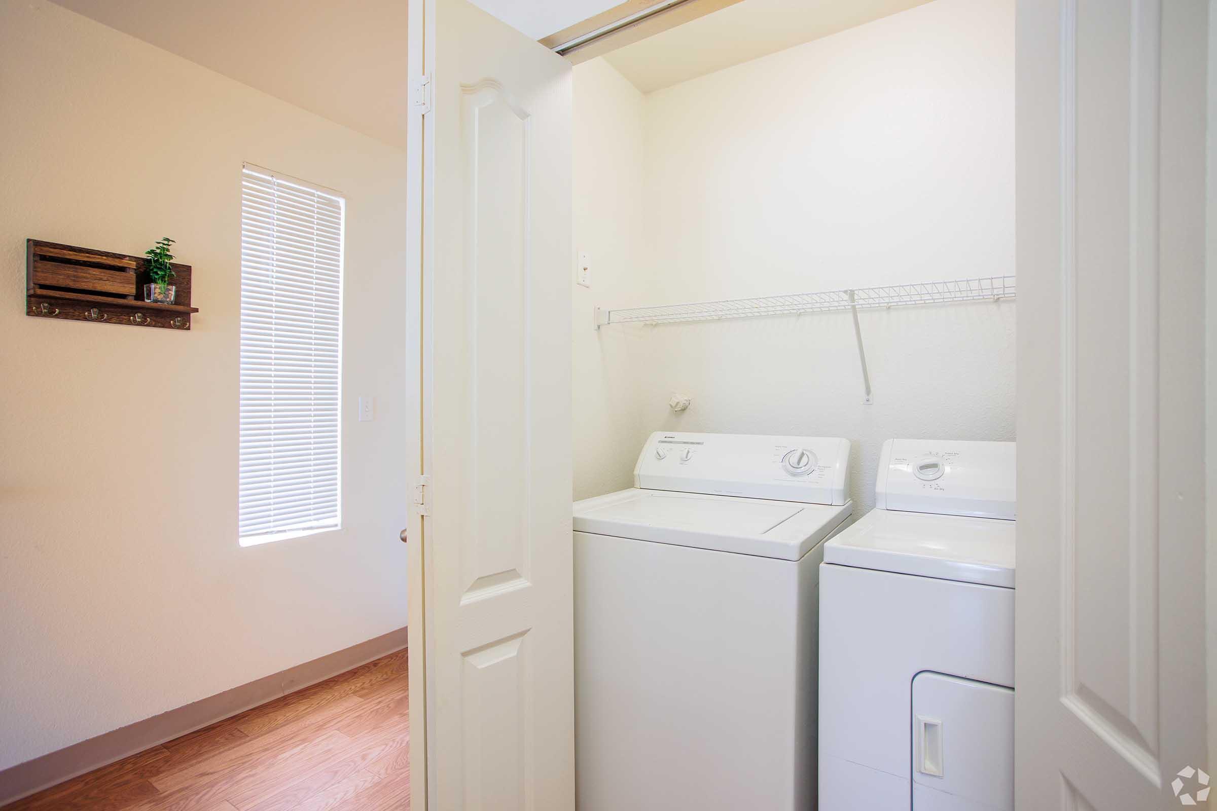 a refrigerator in a small room