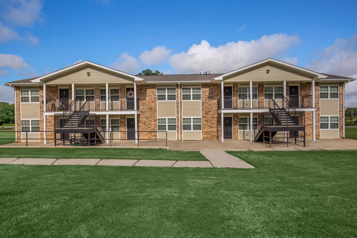 a large lawn in front of a house