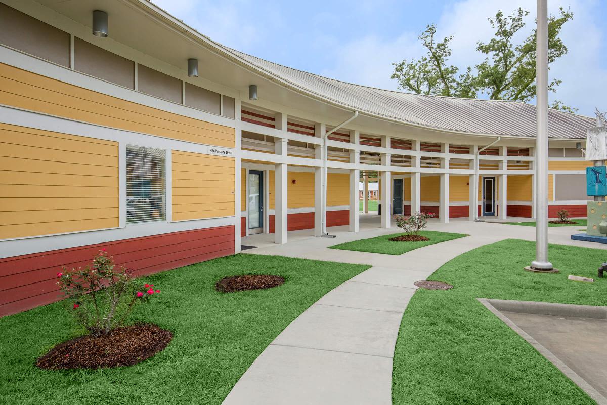 a large lawn in front of a building