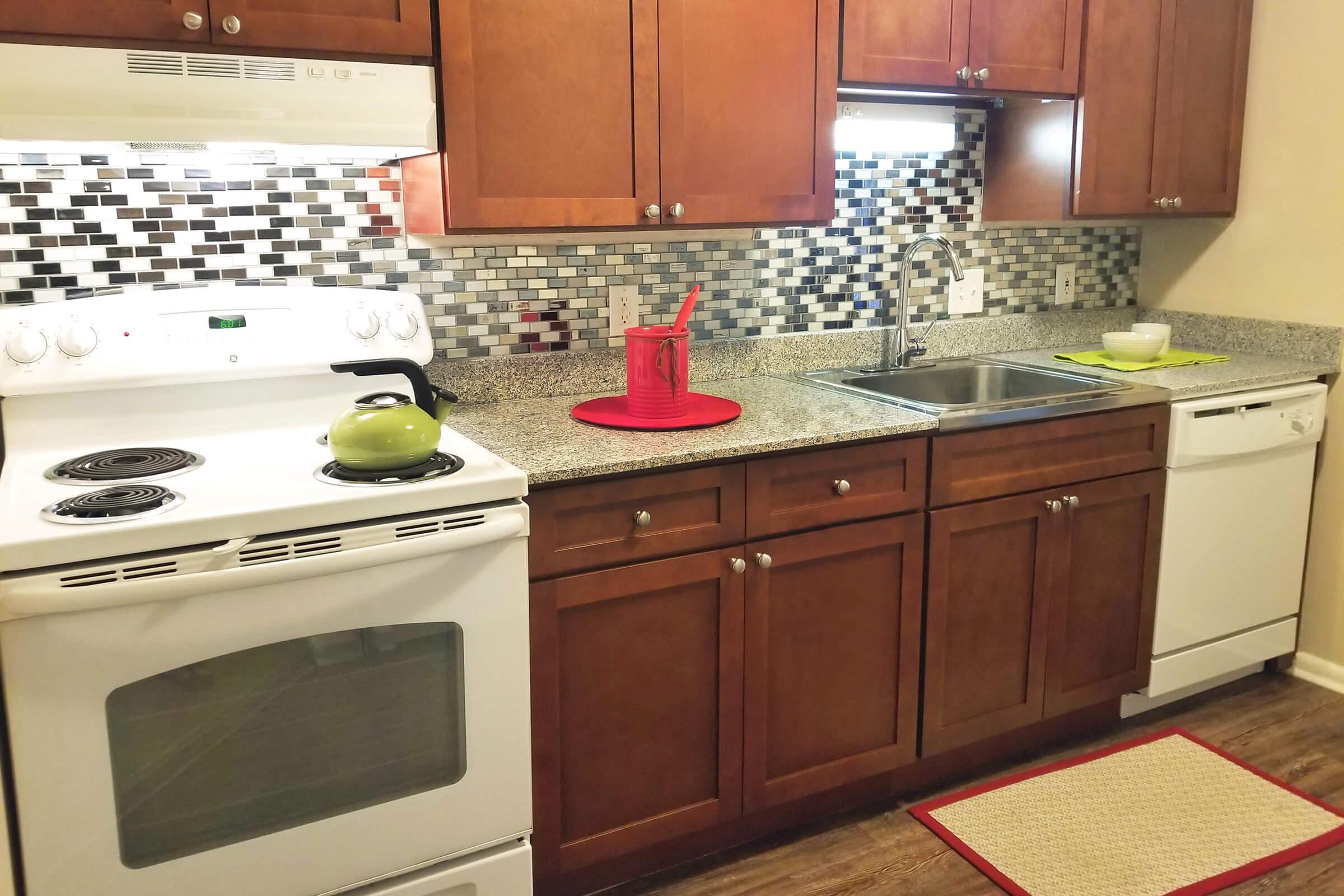 a kitchen with a stove top oven
