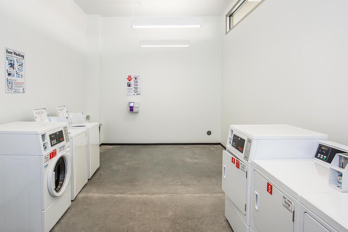 a white refrigerator freezer sitting inside of a kitchen