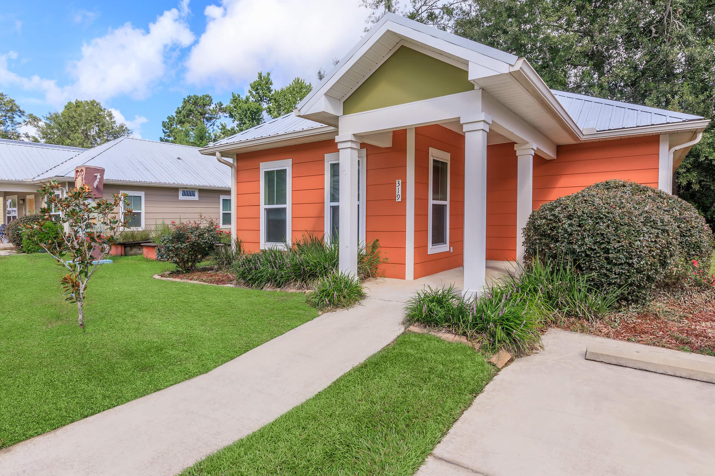 a large lawn in front of a house