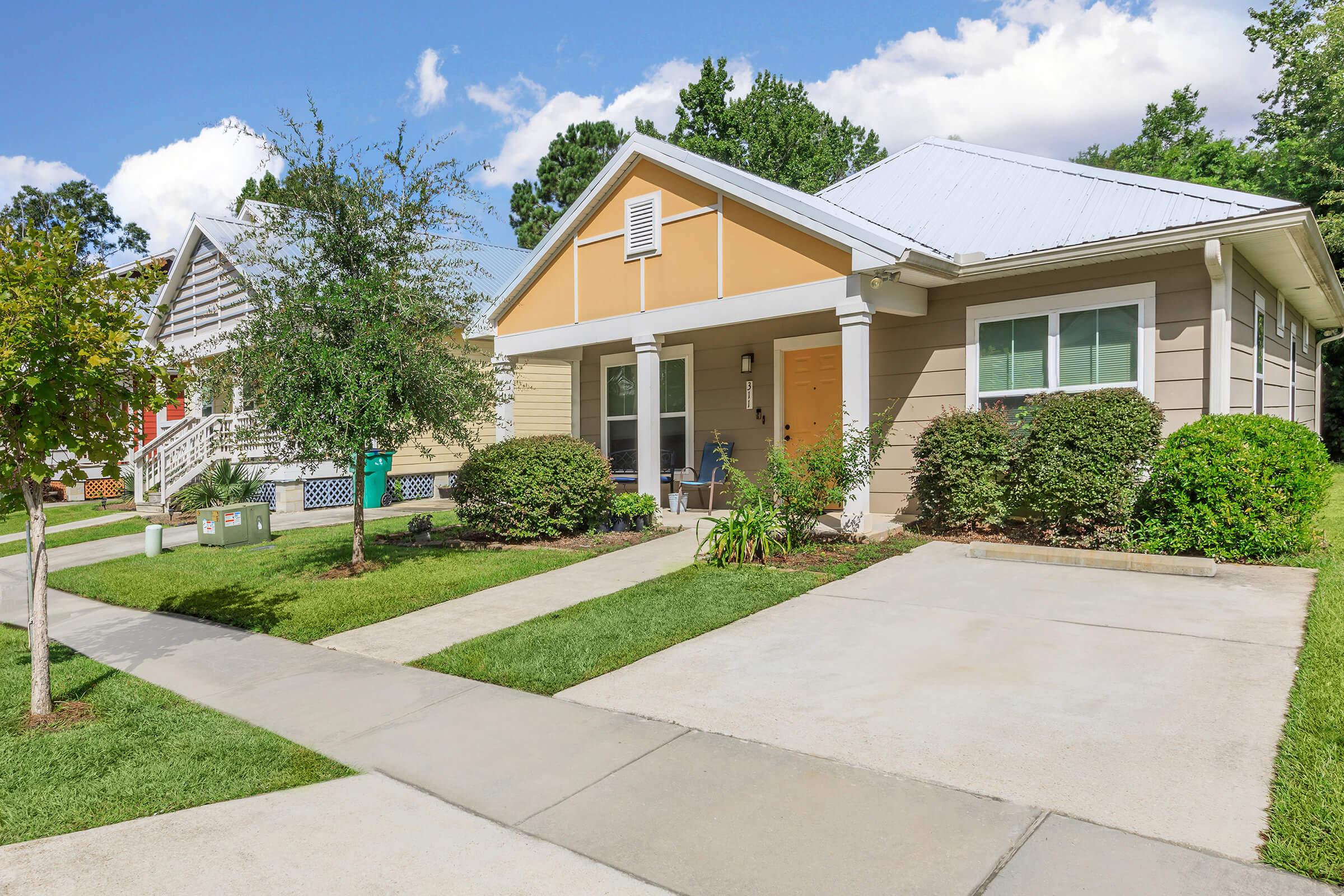 a large lawn in front of a house