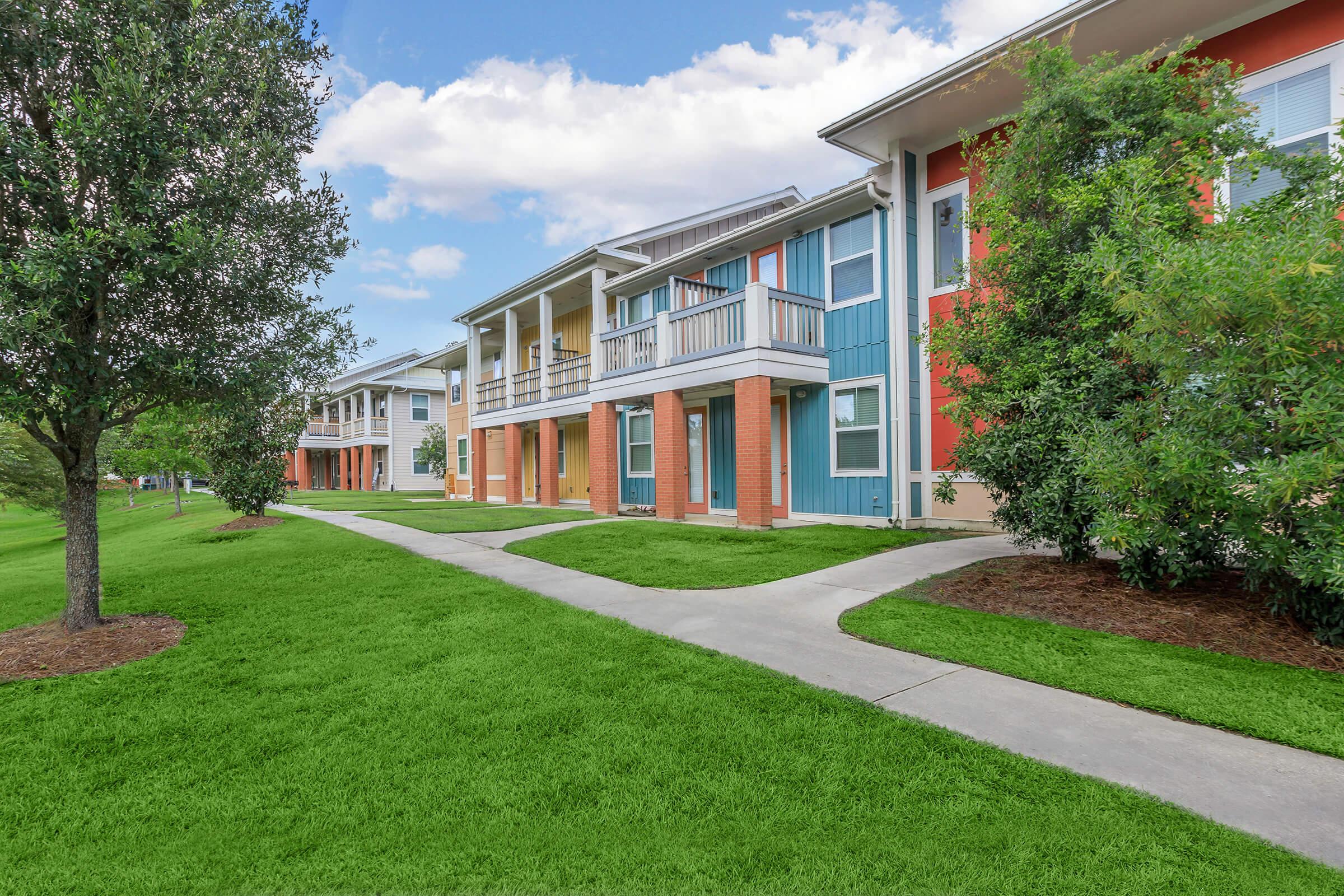 a large lawn in front of a house