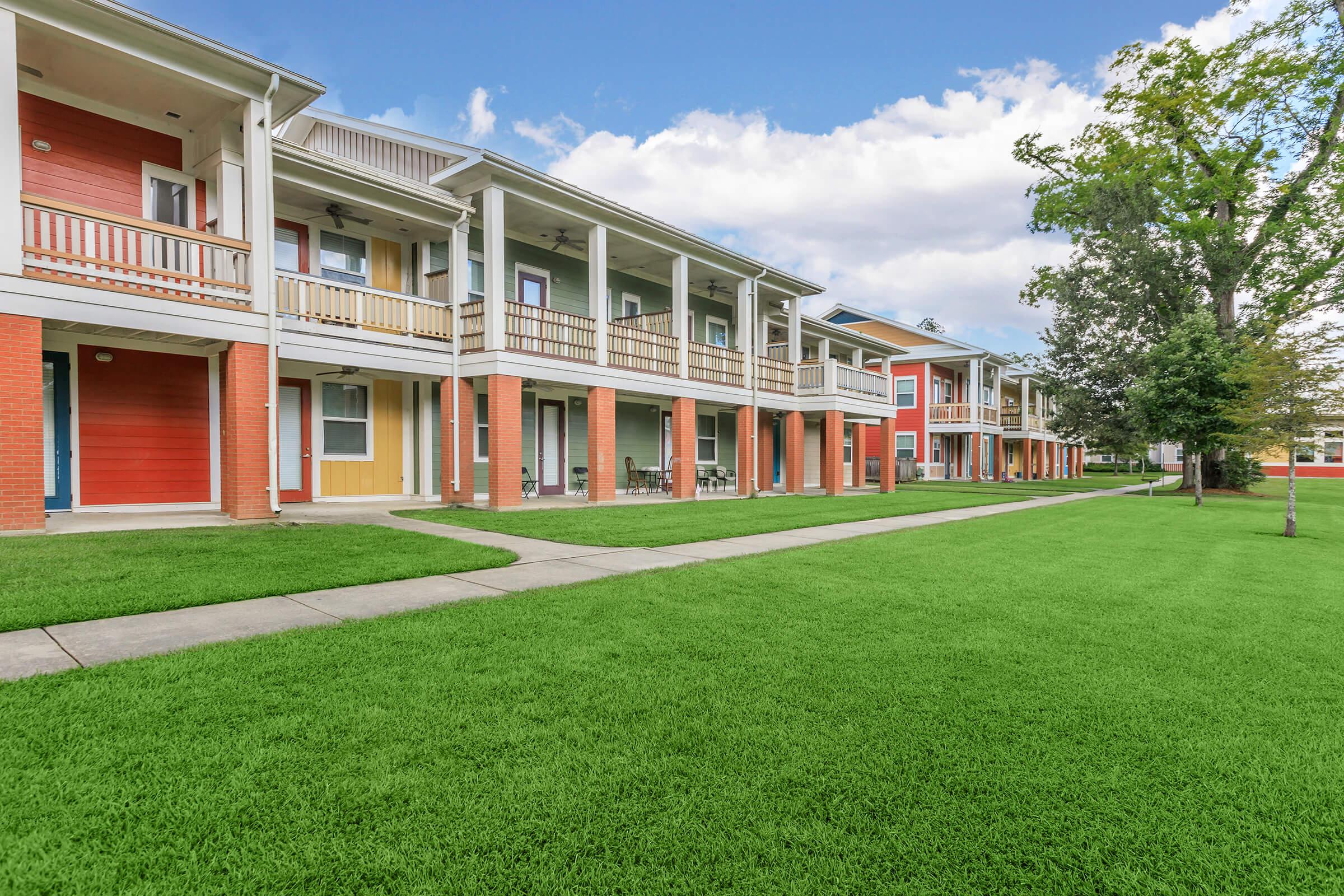 a large lawn in front of a building