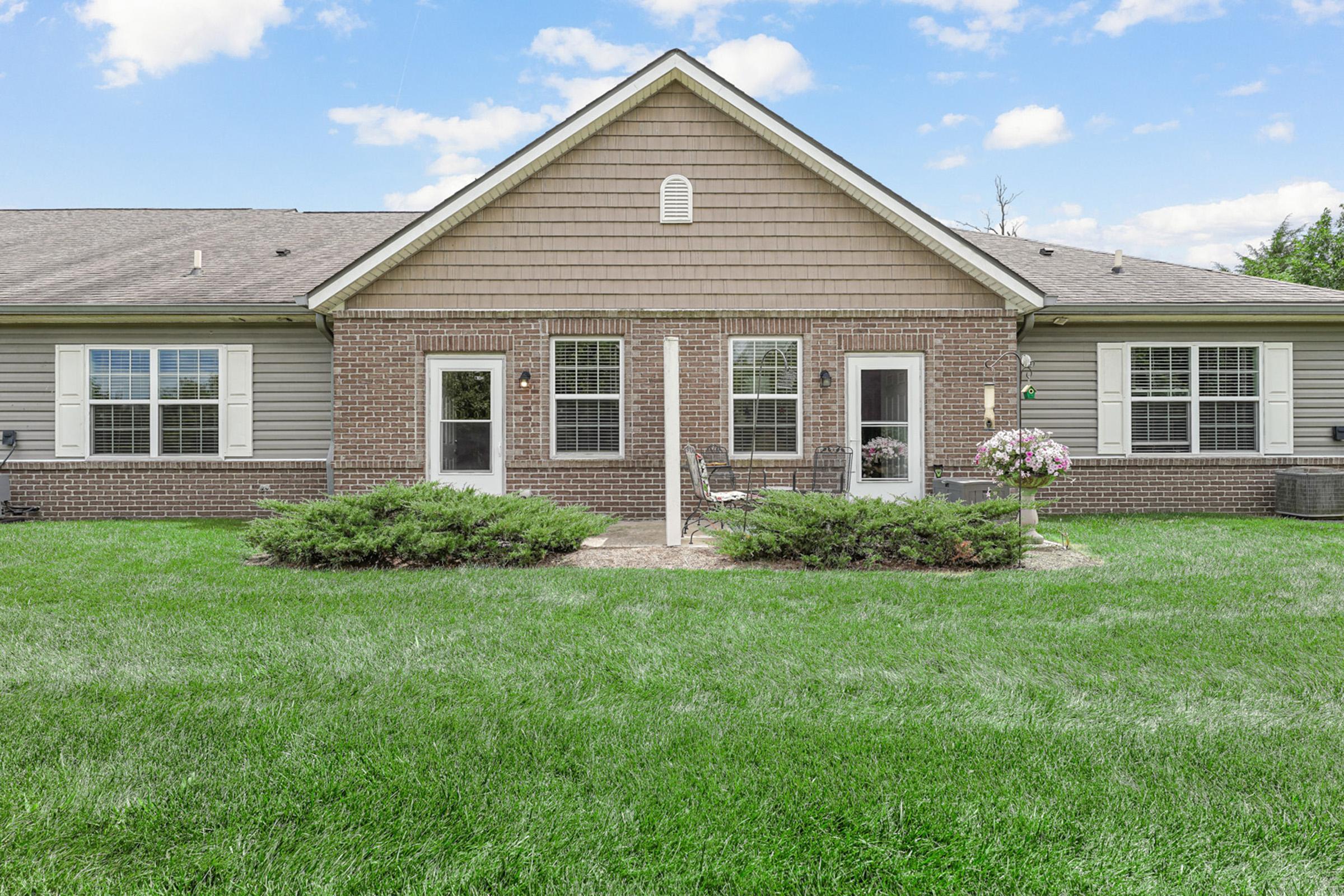 a large lawn in front of a house