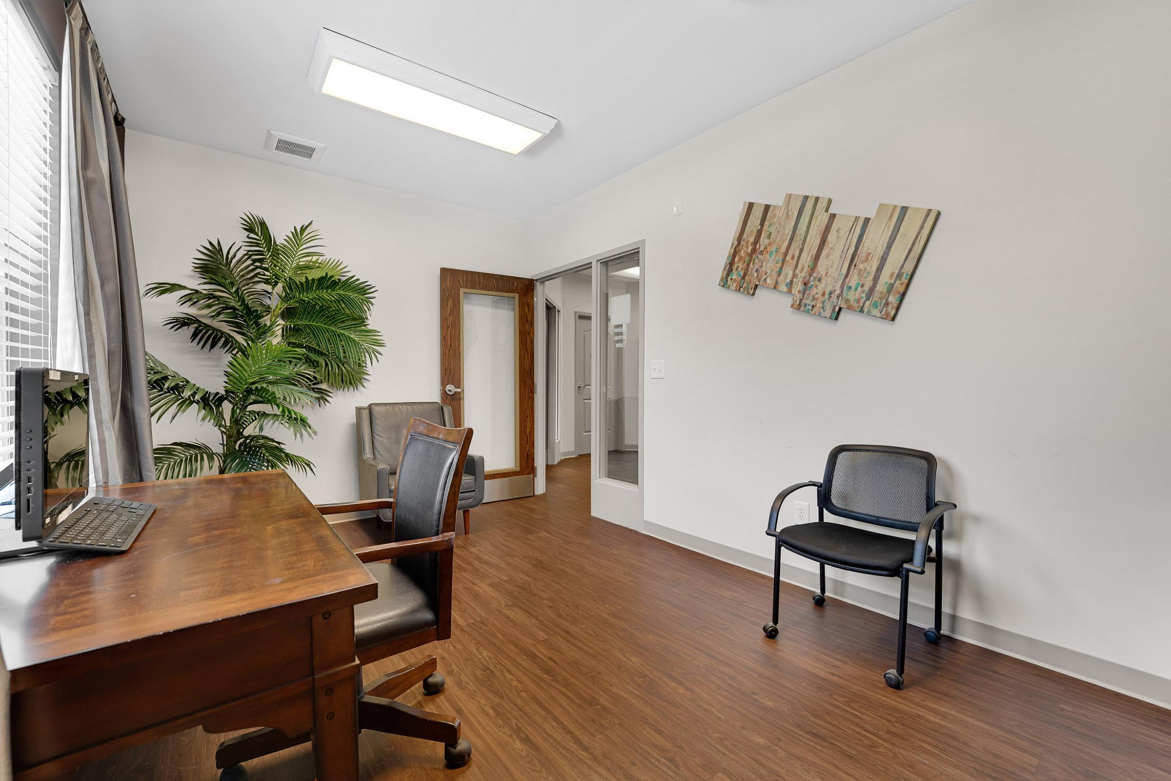 a living room filled with furniture on top of a wooden table