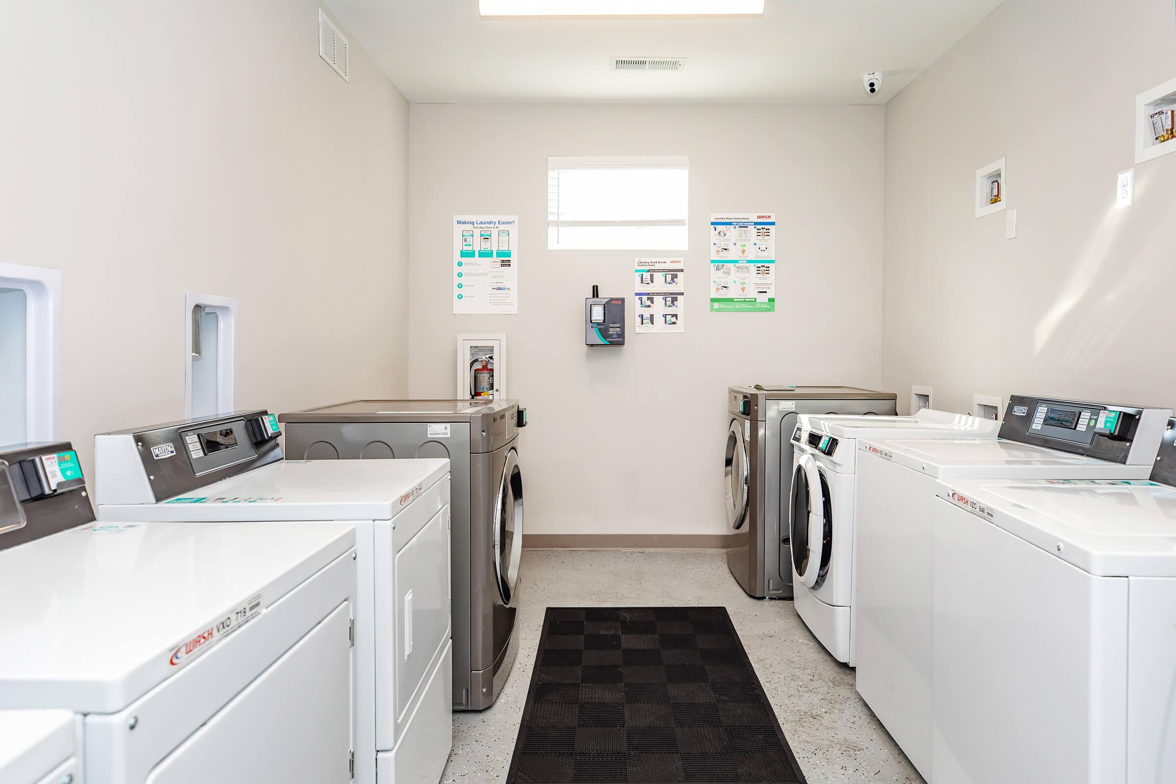 a kitchen with a sink and a refrigerator