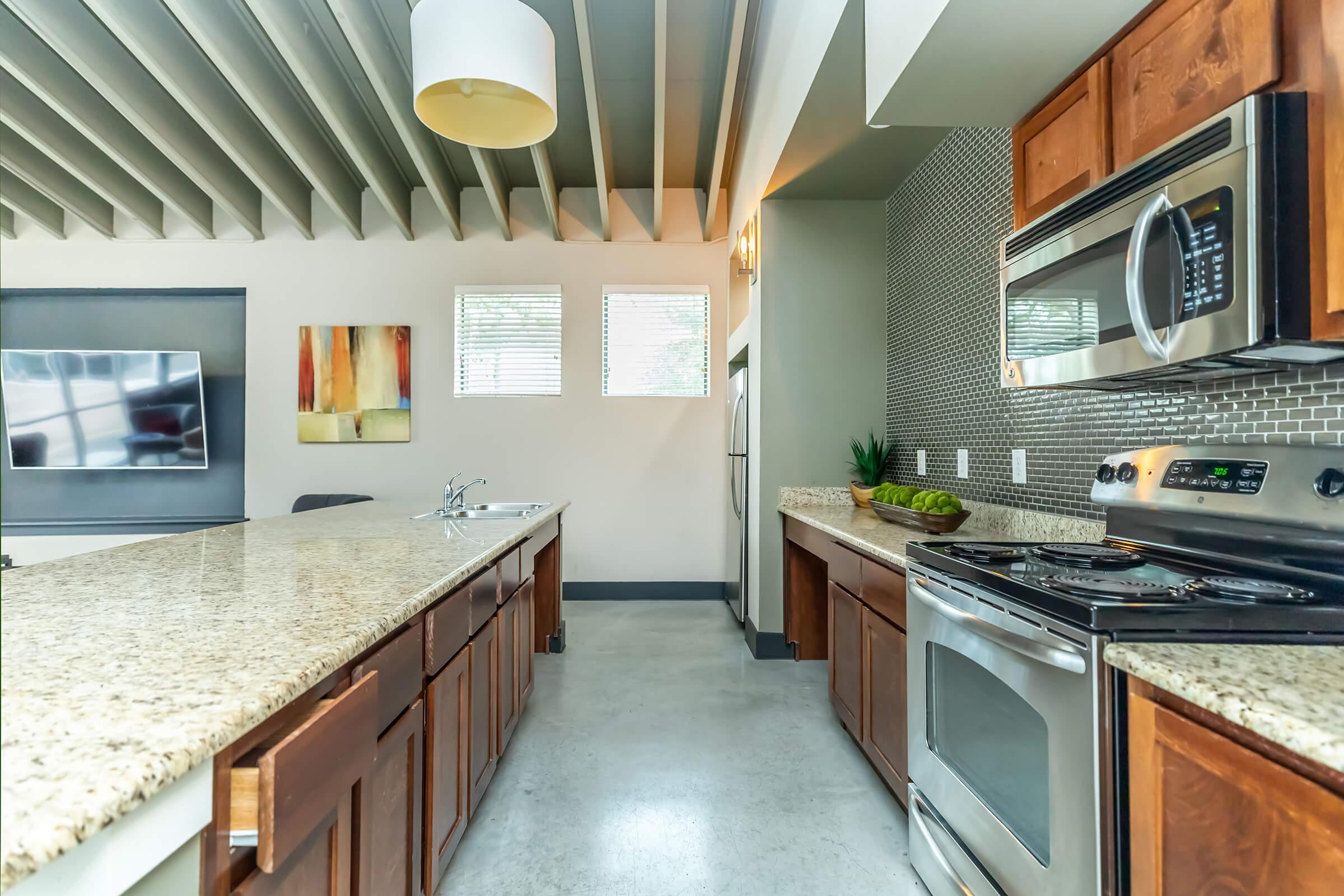 community kitchen with stainless steel appliances