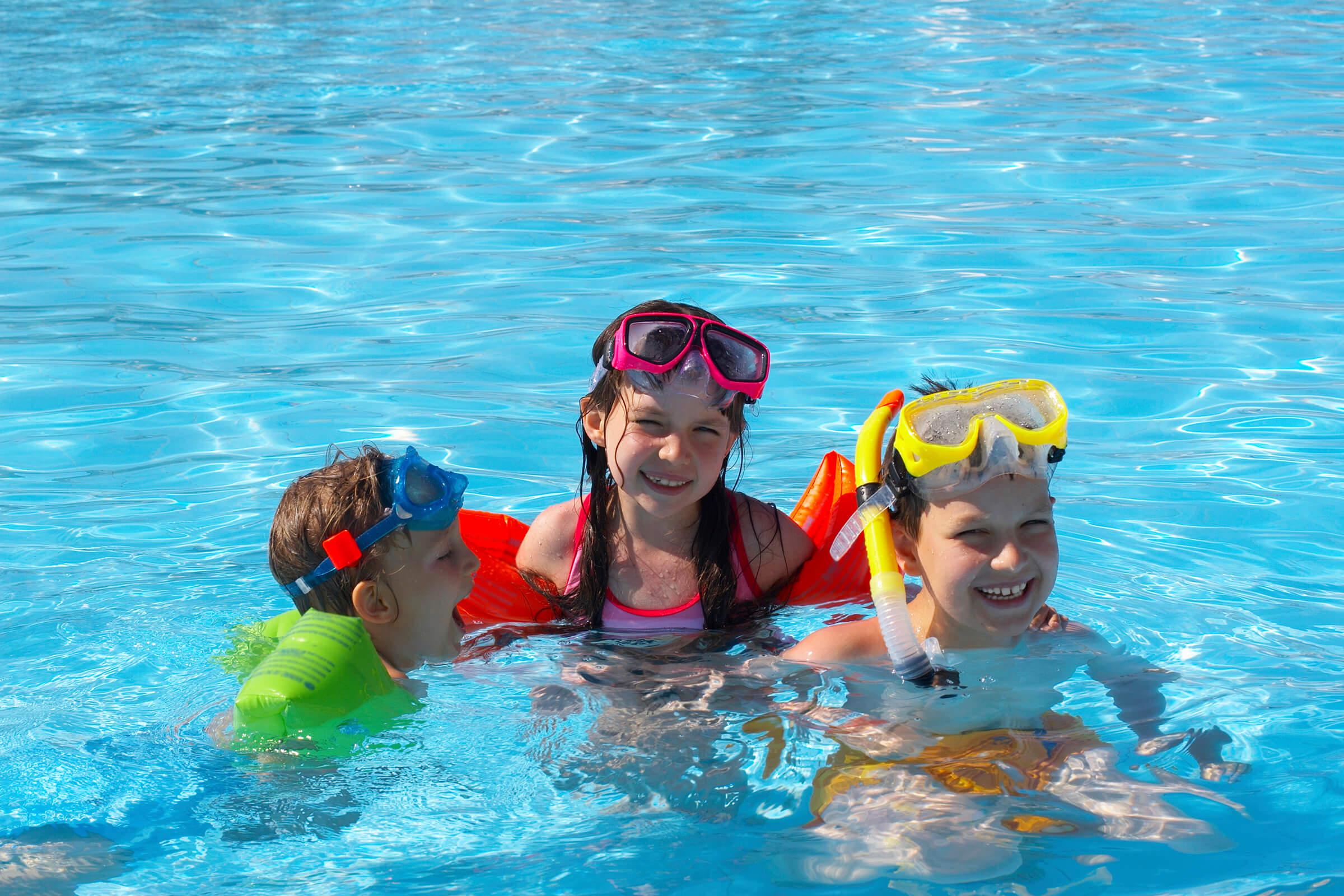 Happy Swimmers in Pool iStock_000003630145_Large.jpg