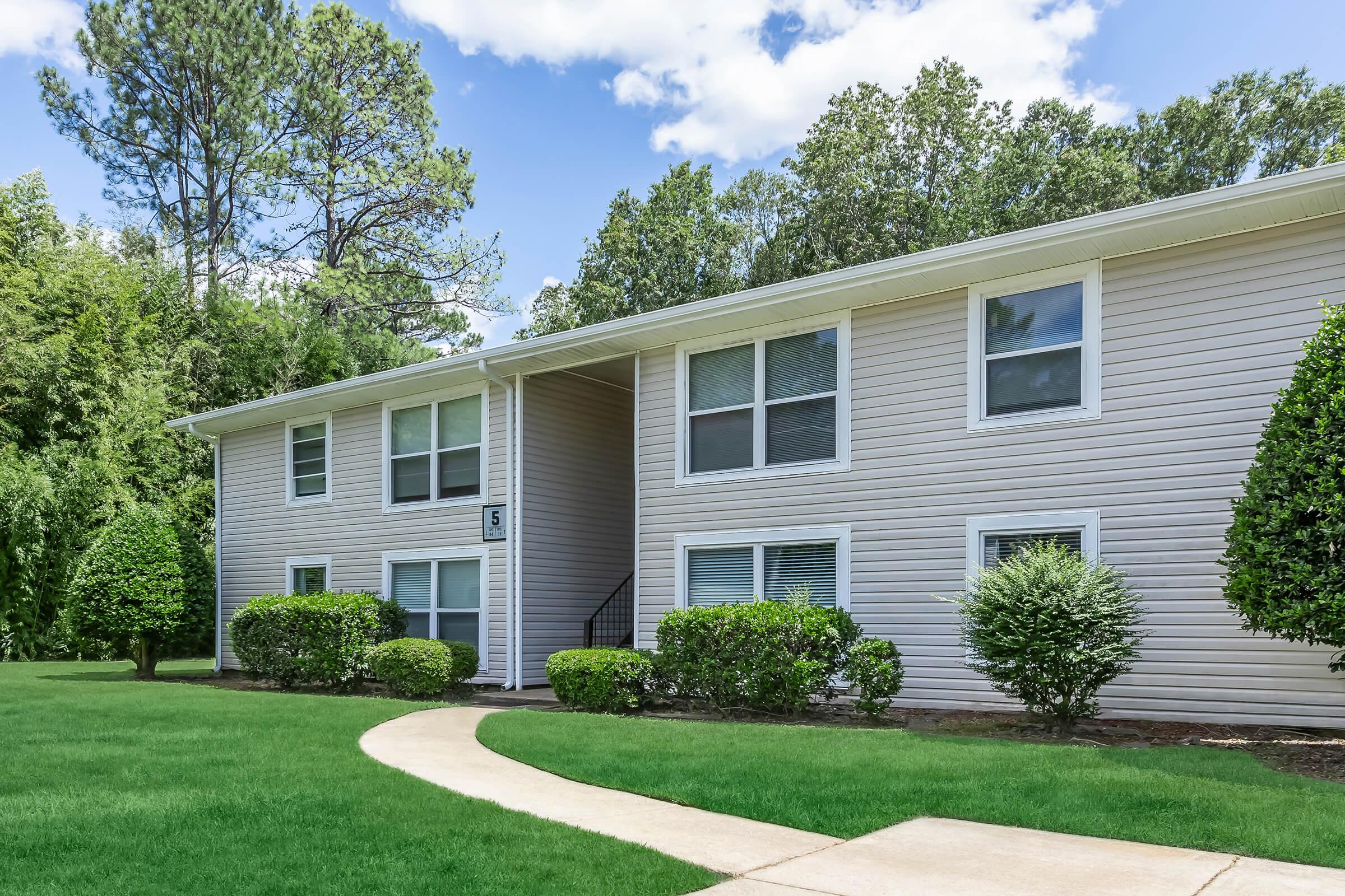 a large lawn in front of a house