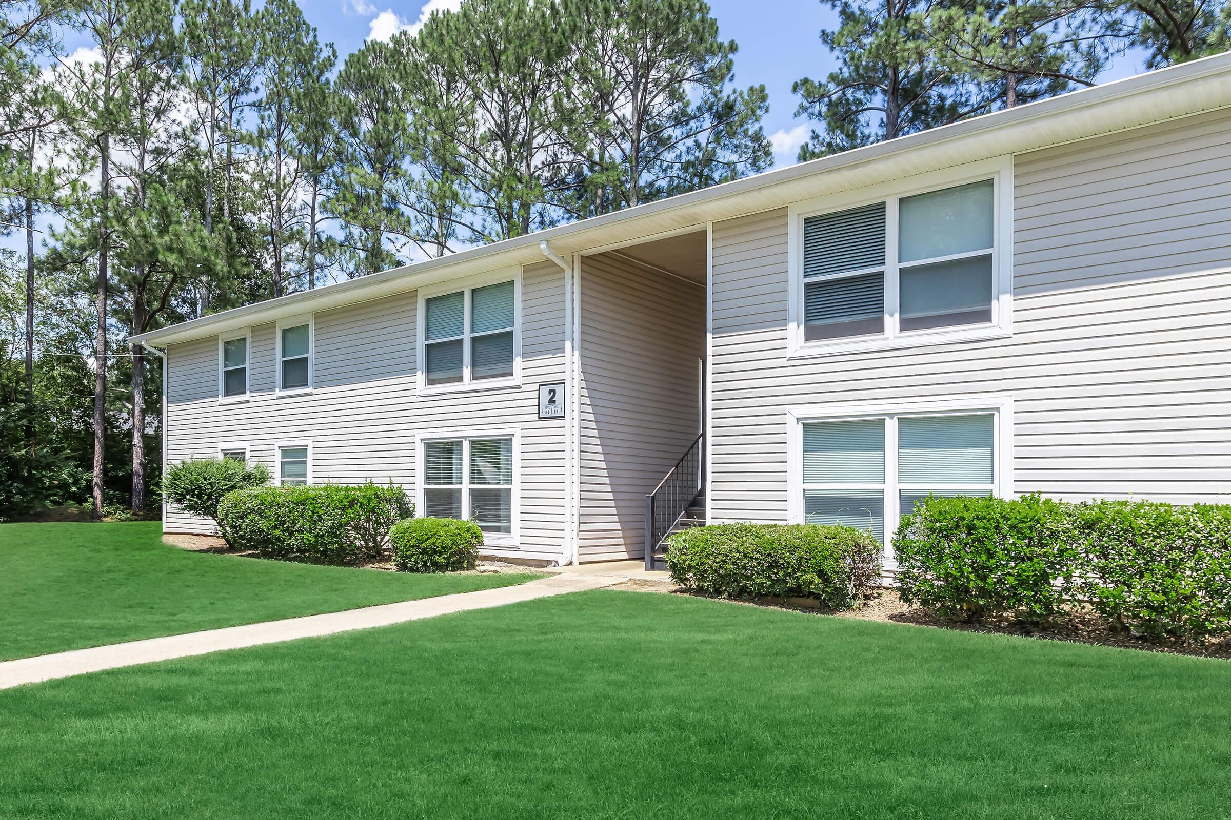 a large lawn in front of a house