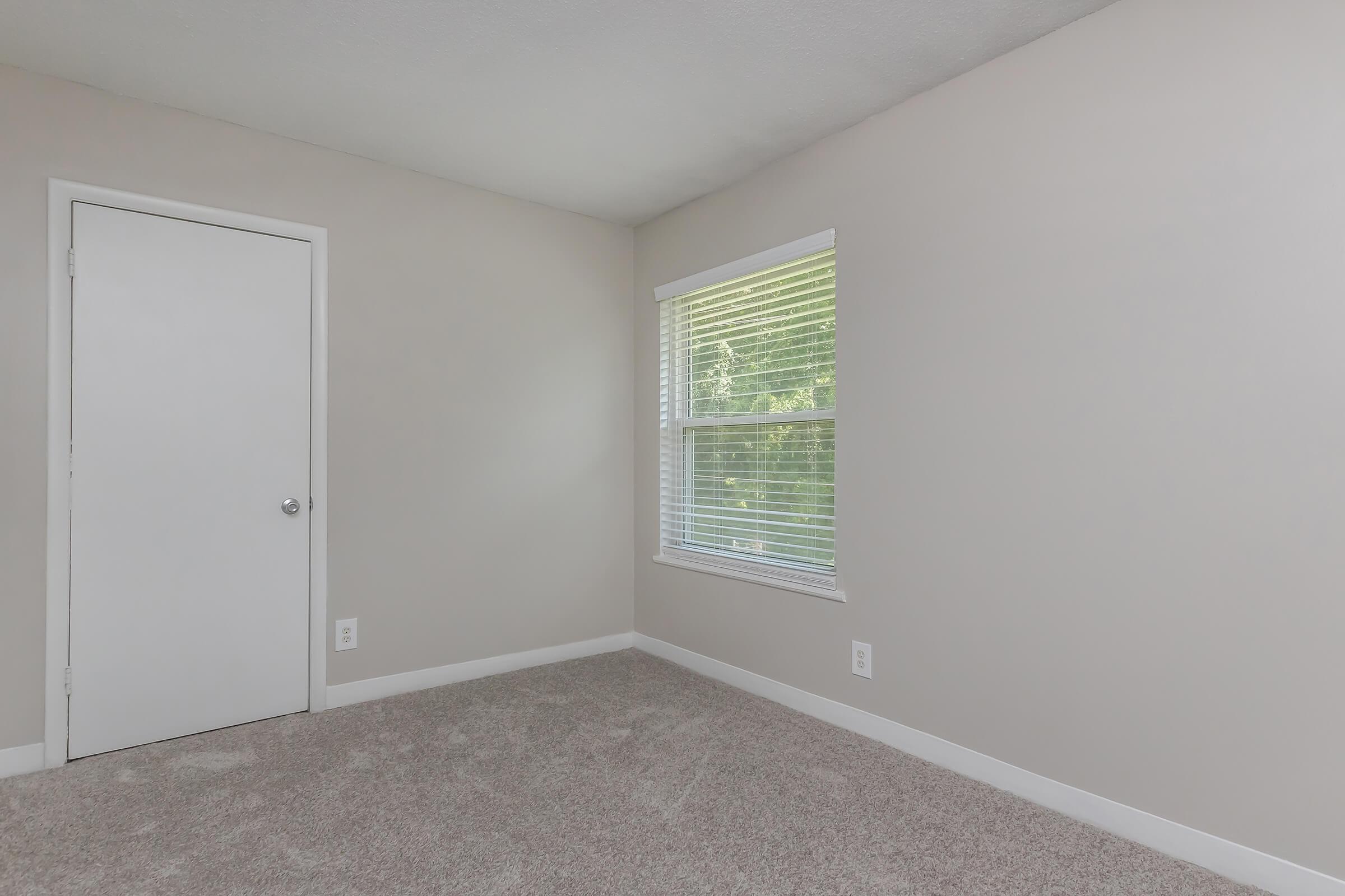 a room with a sink and a window