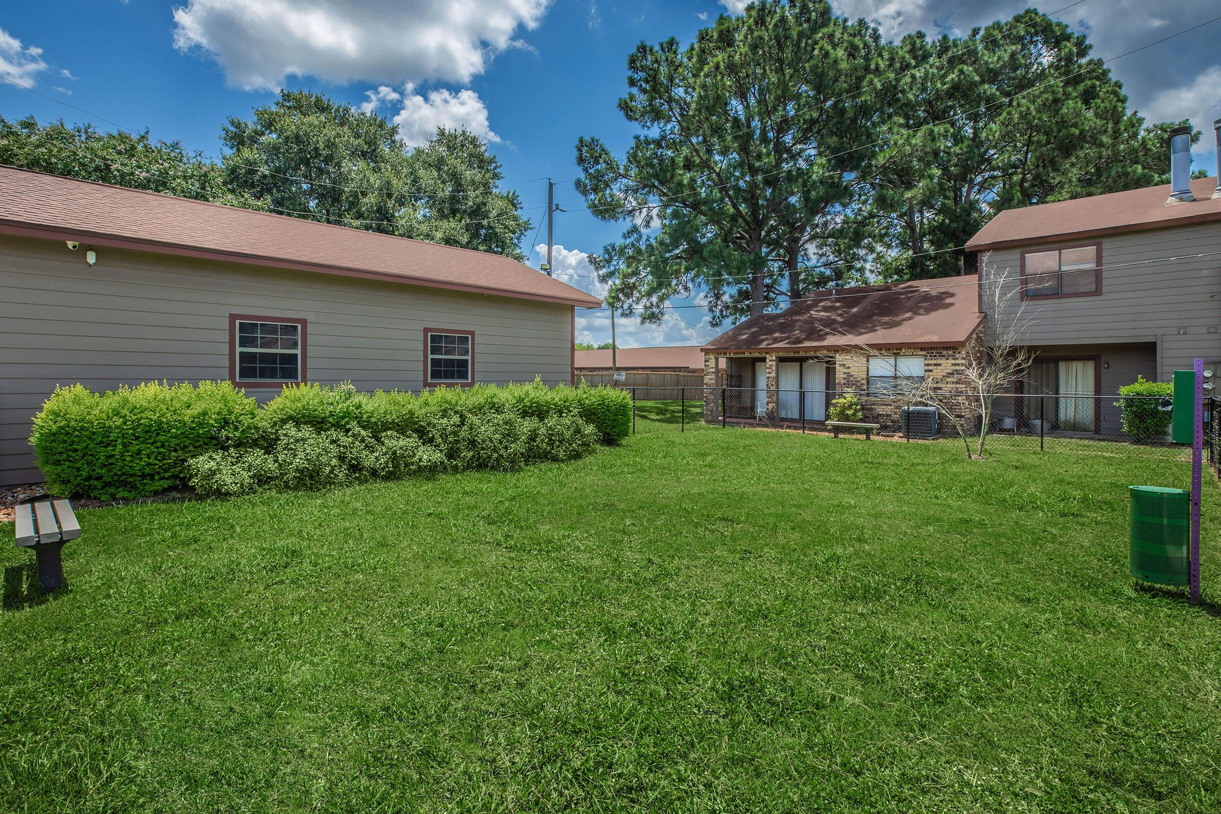 a large lawn in front of a house