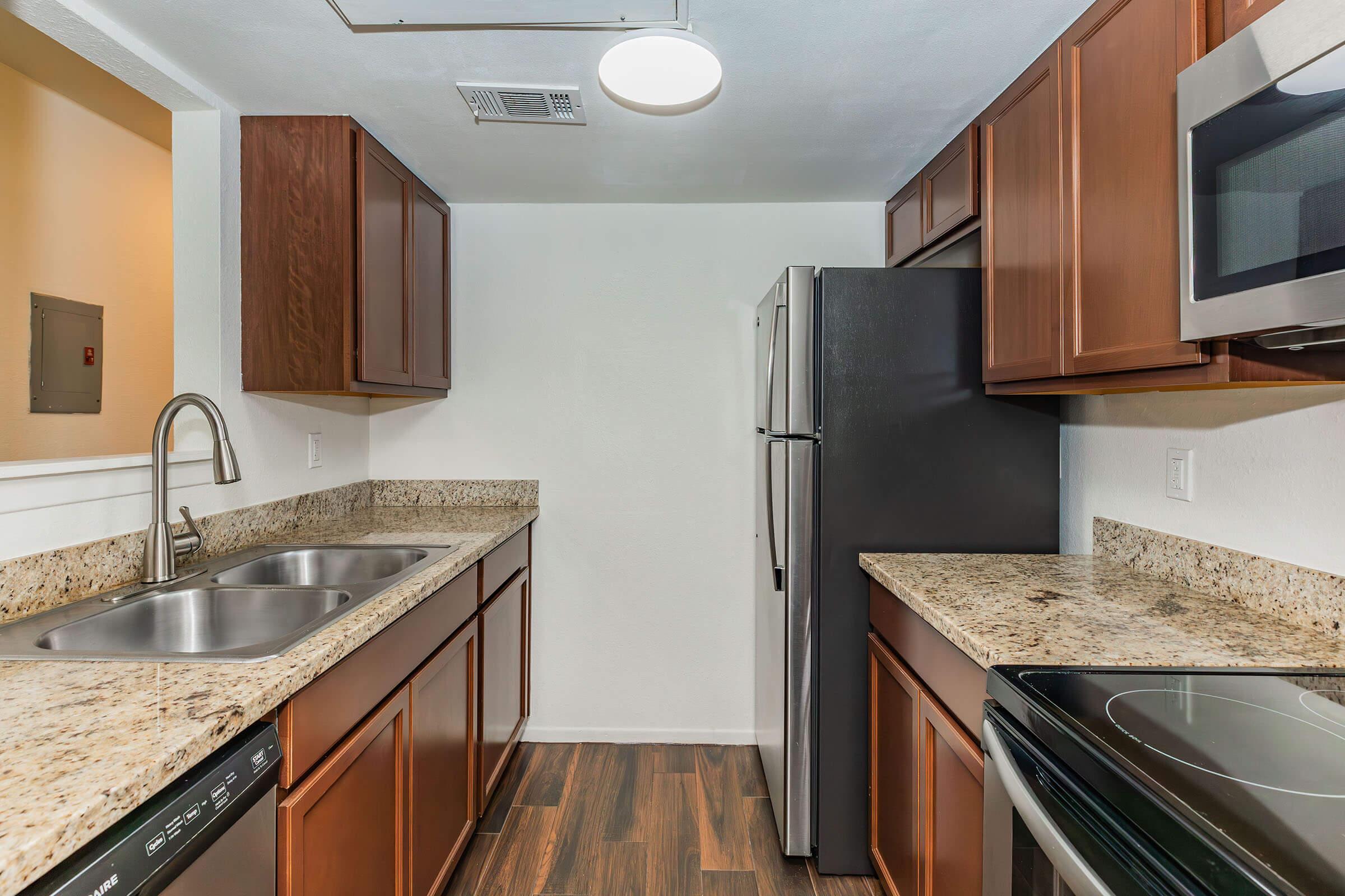 a modern kitchen with stainless steel appliances