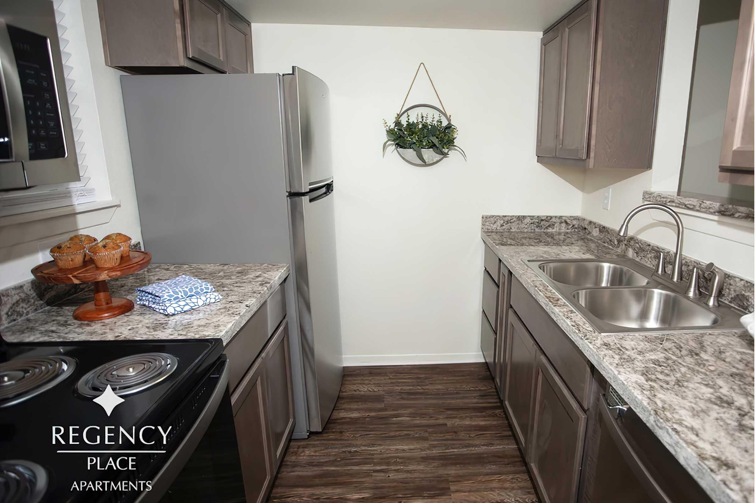 a kitchen with a sink and a window