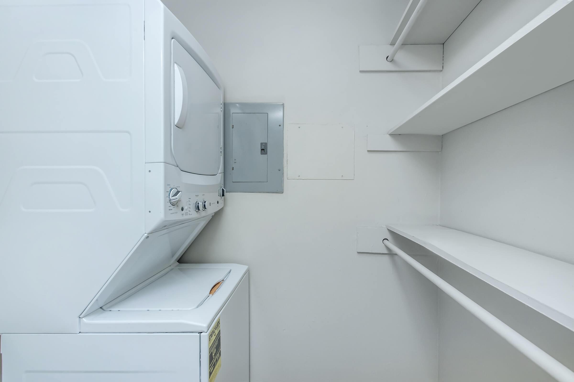 a kitchen with a sink and a microwave