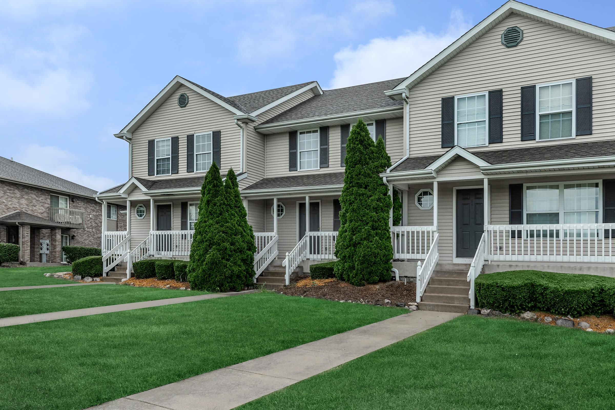 a large lawn in front of a house