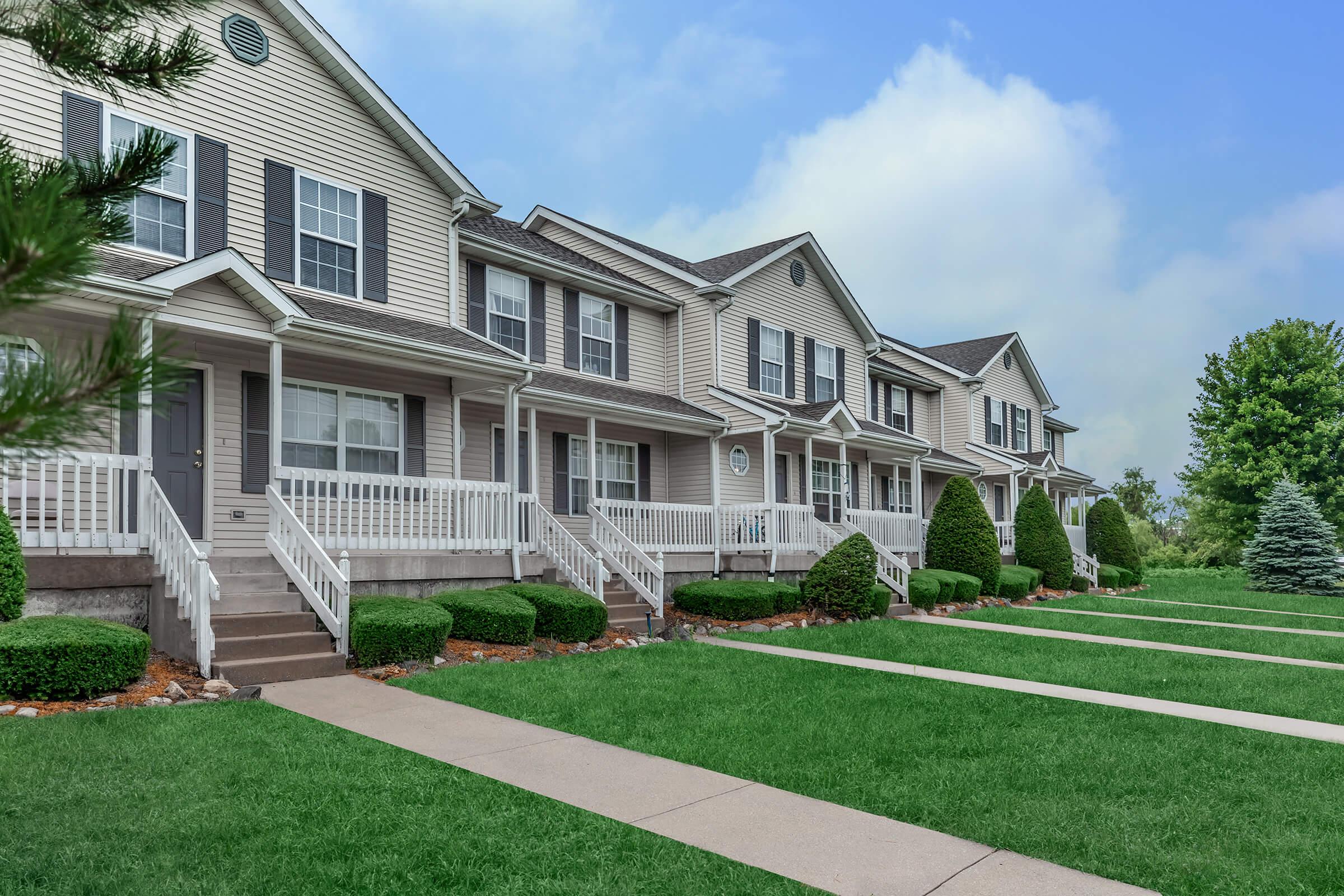 a large lawn in front of a house