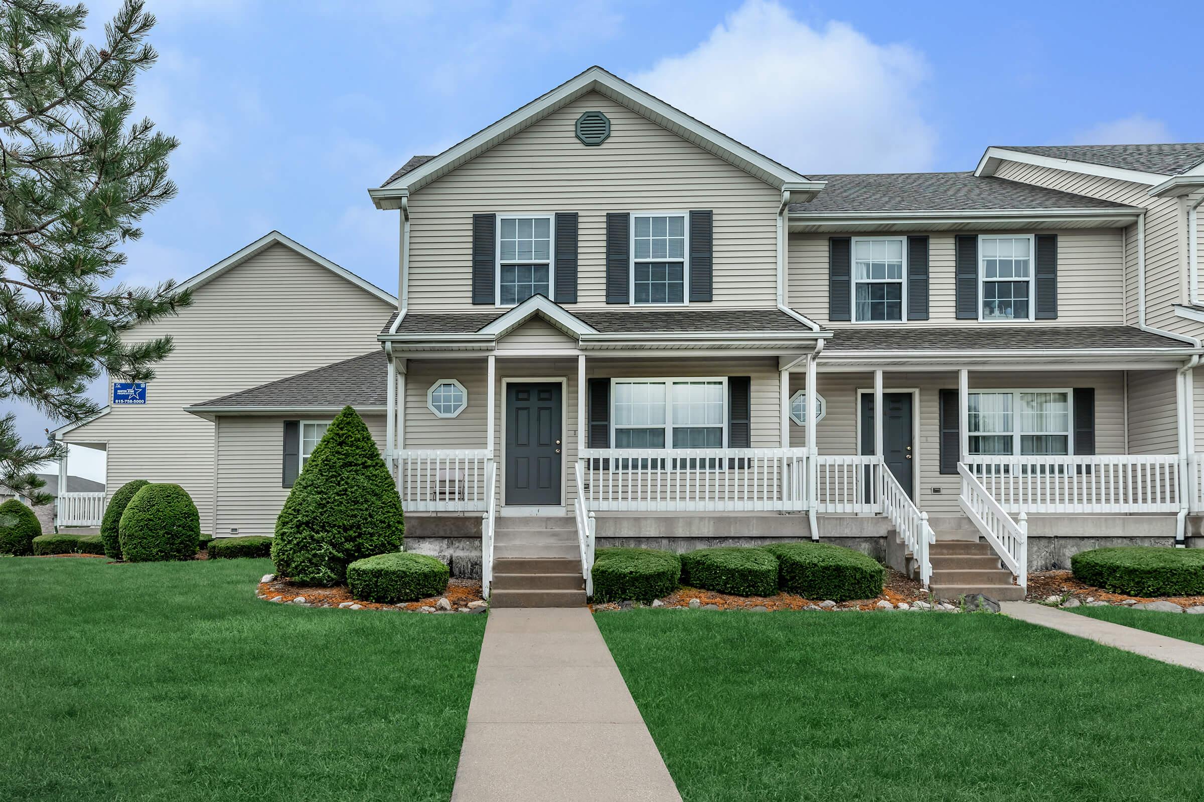 a large lawn in front of a house