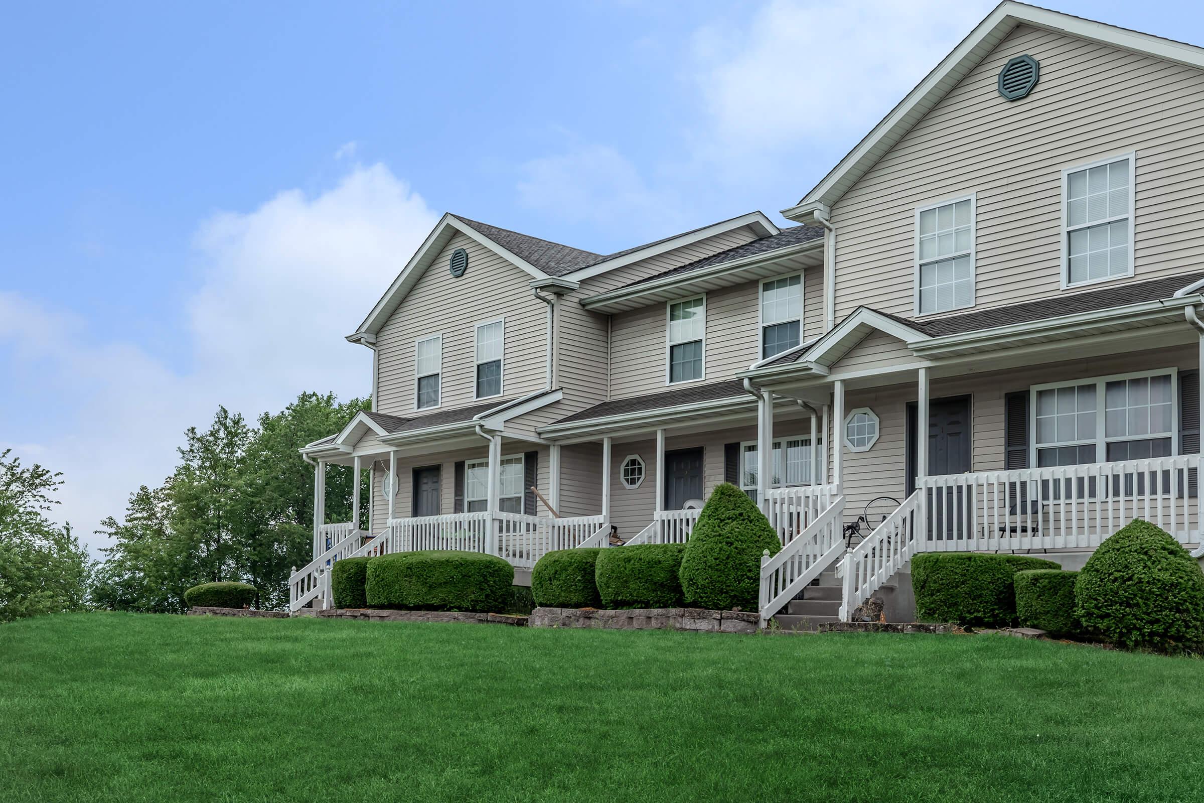 a large lawn in front of a house