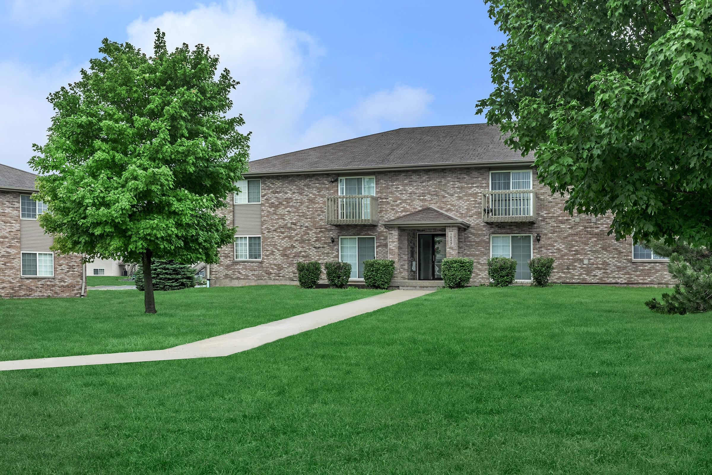 a large lawn in front of a house