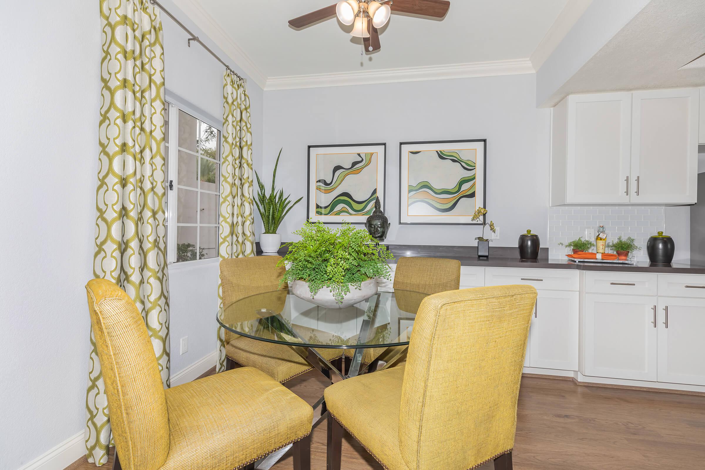 a living room filled with furniture and decor