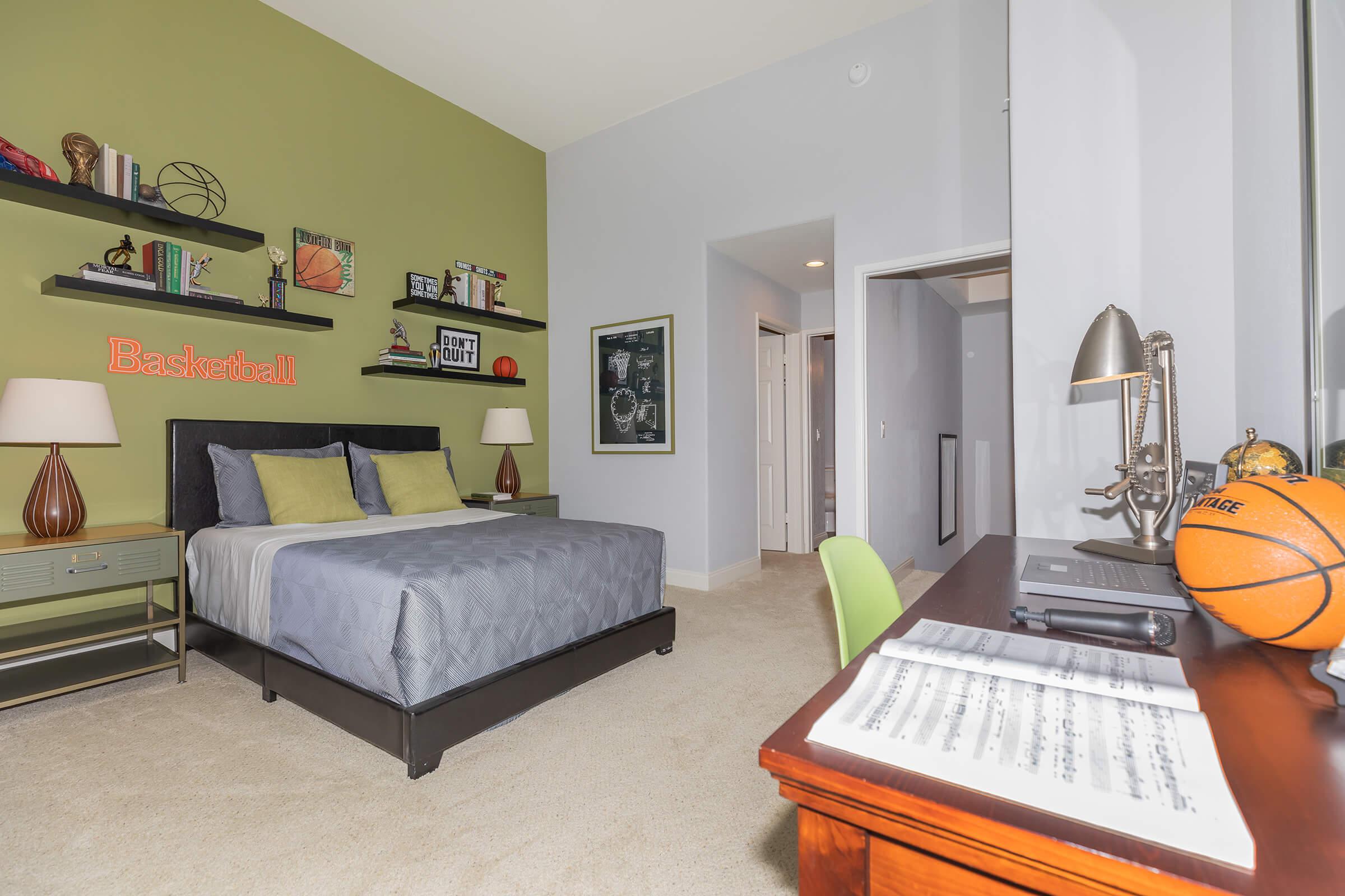 a living room filled with furniture and a flat screen tv